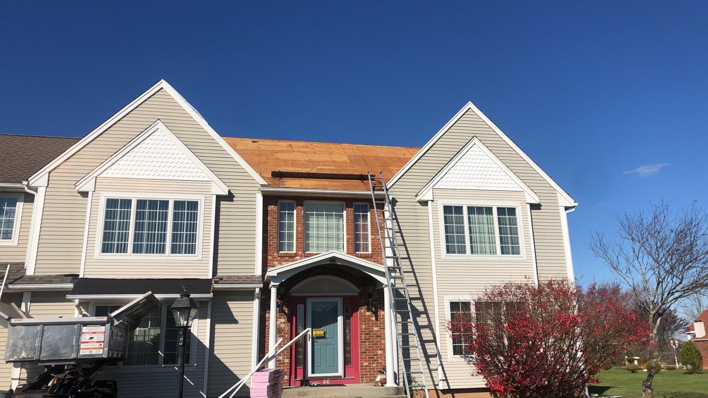 Commercial Roofing Installation using Owens Corning TruDefinition driftwood by A Plus Exterior