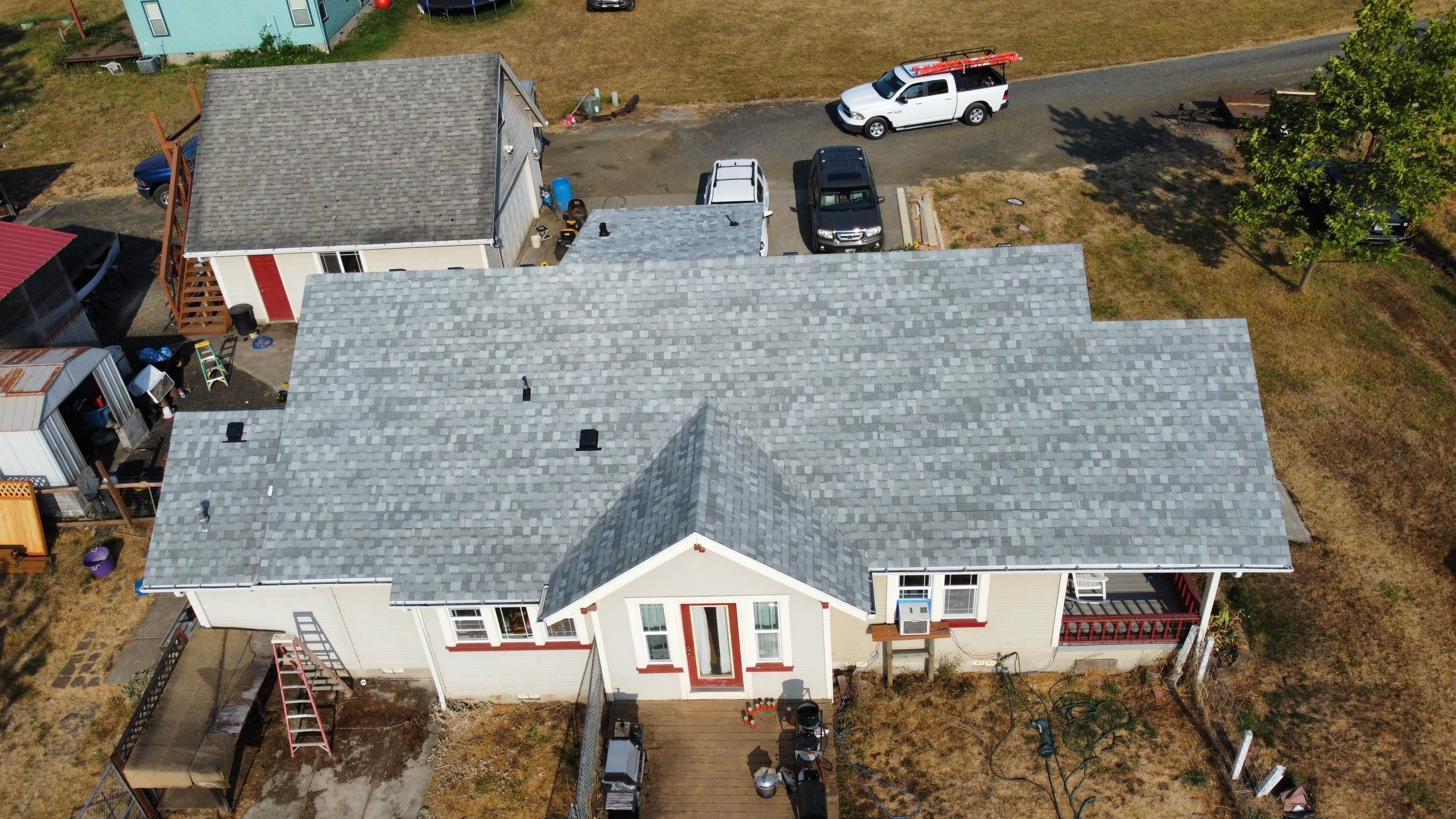 Residential Roofing Installation using IKO Dynasty (Color: Frostone Grey) by Orezona Building & Roofing Company, Inc.