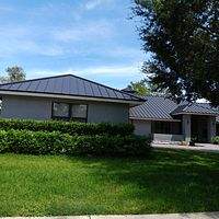 24ga 1.5" Mechanical Seam Dark Bronze by Total Roofing System The Metal Roof Experts