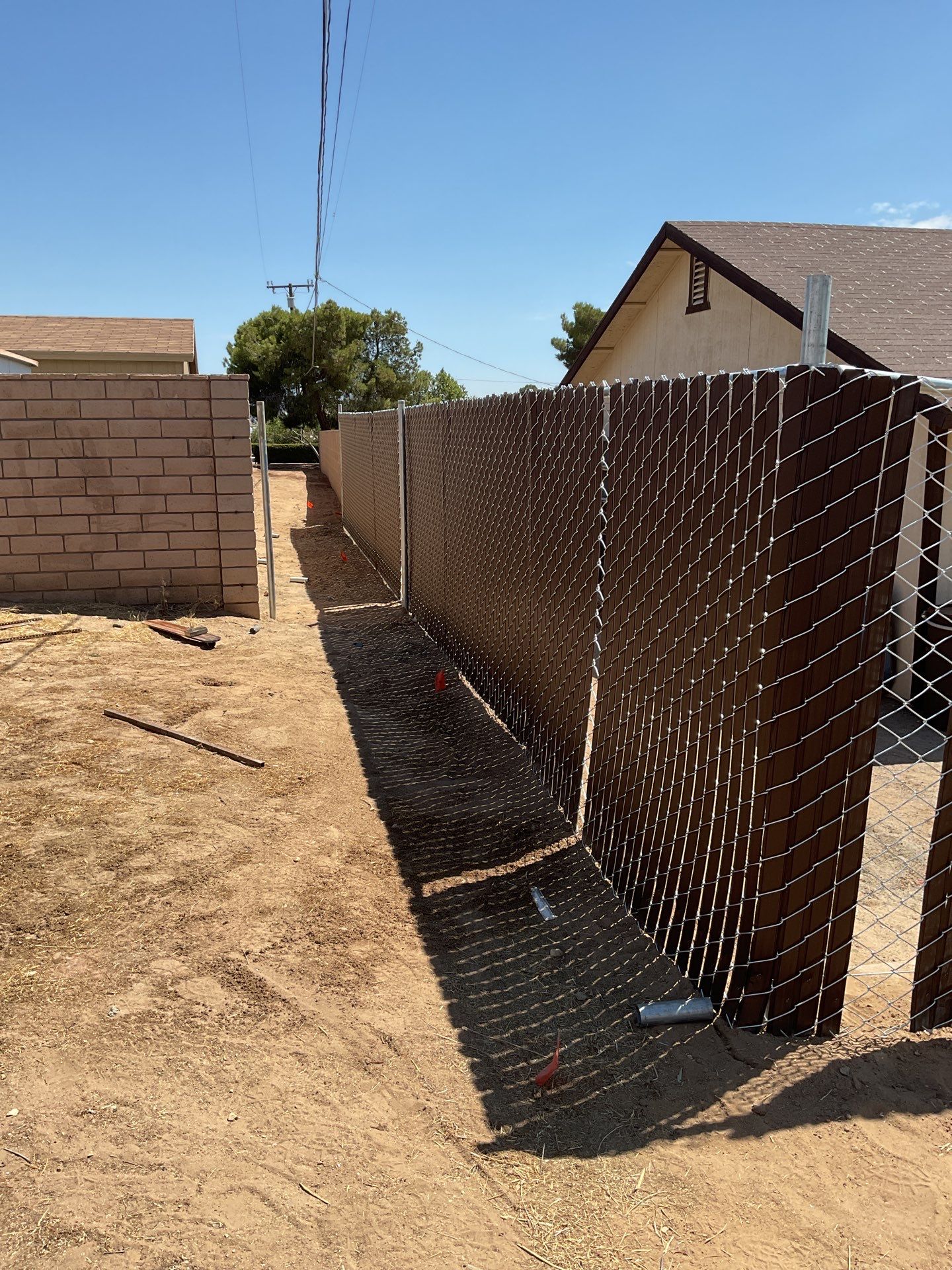 Dark Brown Privacy Chain Link Fence by Fence Guys Inc.