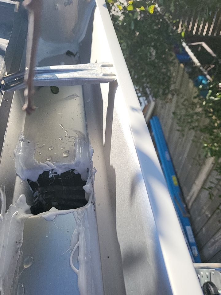 Gutter Installation using K-Style White Seamless Gutters by Gutter Professors