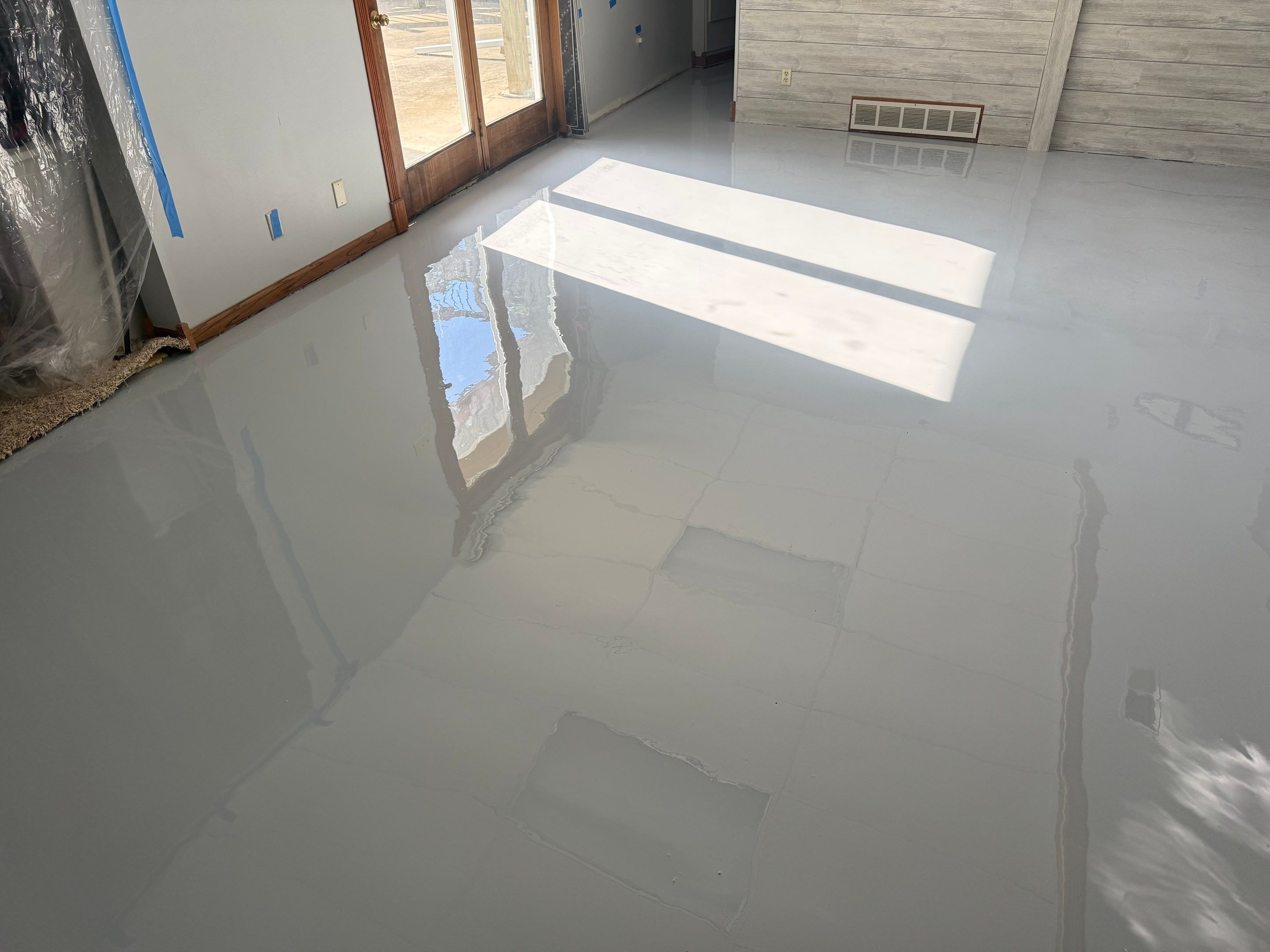 Solid Color Concrete Floor Coating for Renner Basement by Select Painting, Coatings & Garage Cabinets