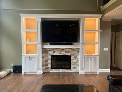 Custom Stone Fireplace and White Built-in Cabinetry in Suwanee