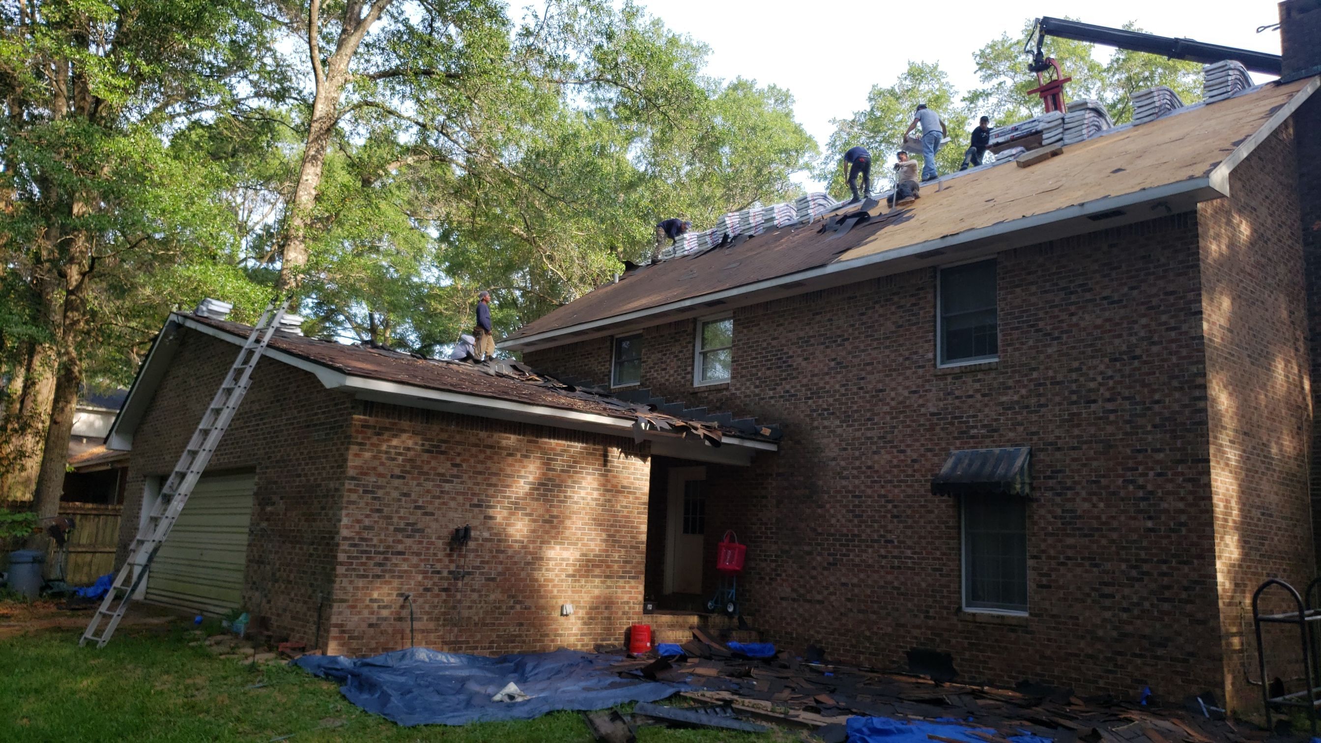 Residential Roofing Installation using Roof Replacement by American Roofing & Construction LLC