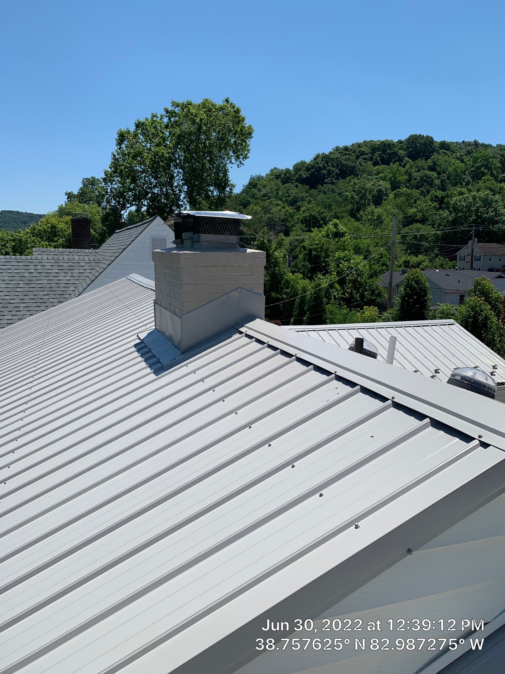 Metal Roofing, Skylights, Porch Build by Secure Construction Company Inc