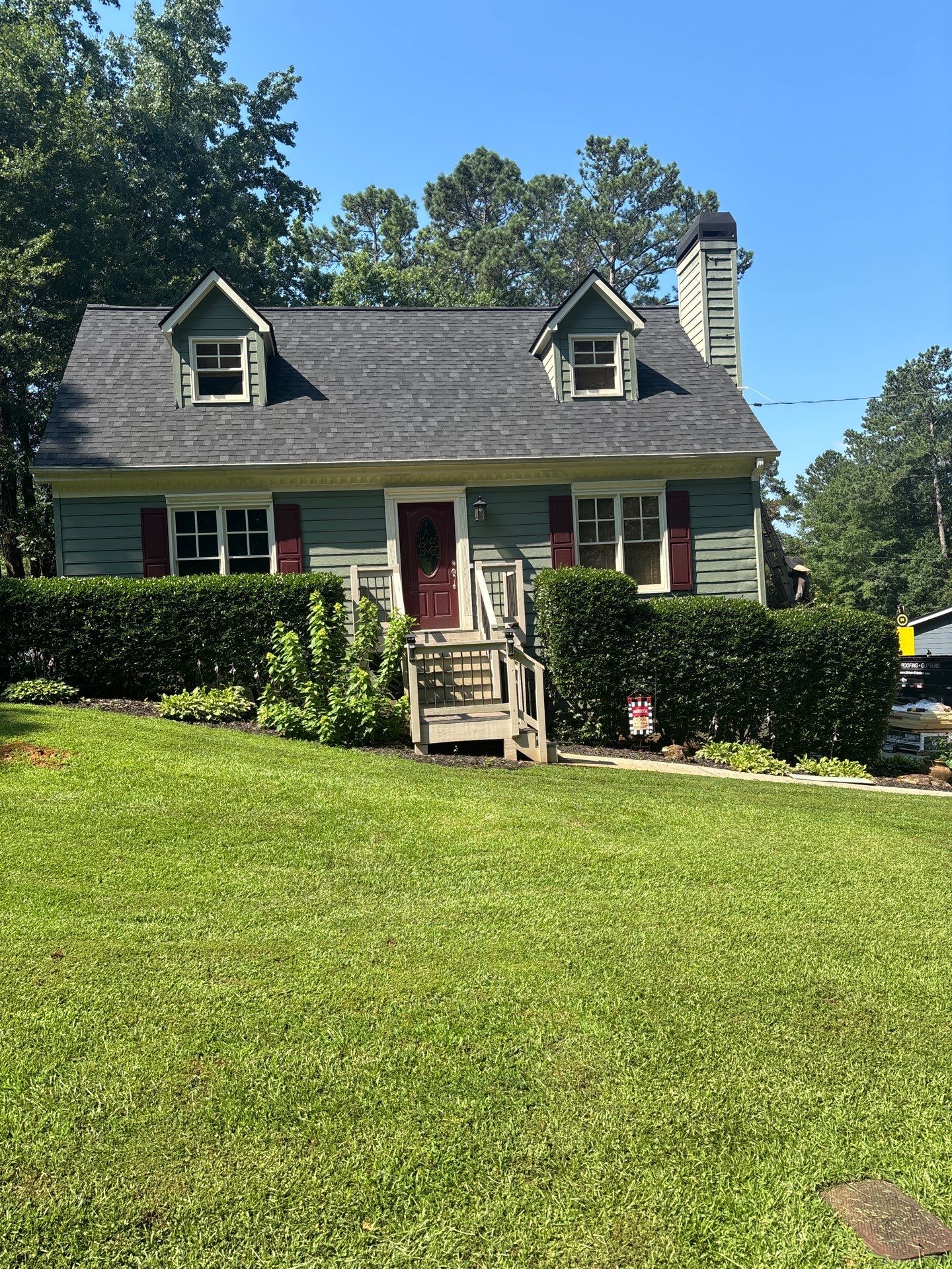 James Hardie Siding Install, Rotten Wood and Gutter Replacement and Exterior Painting by Nelson Exteriors 