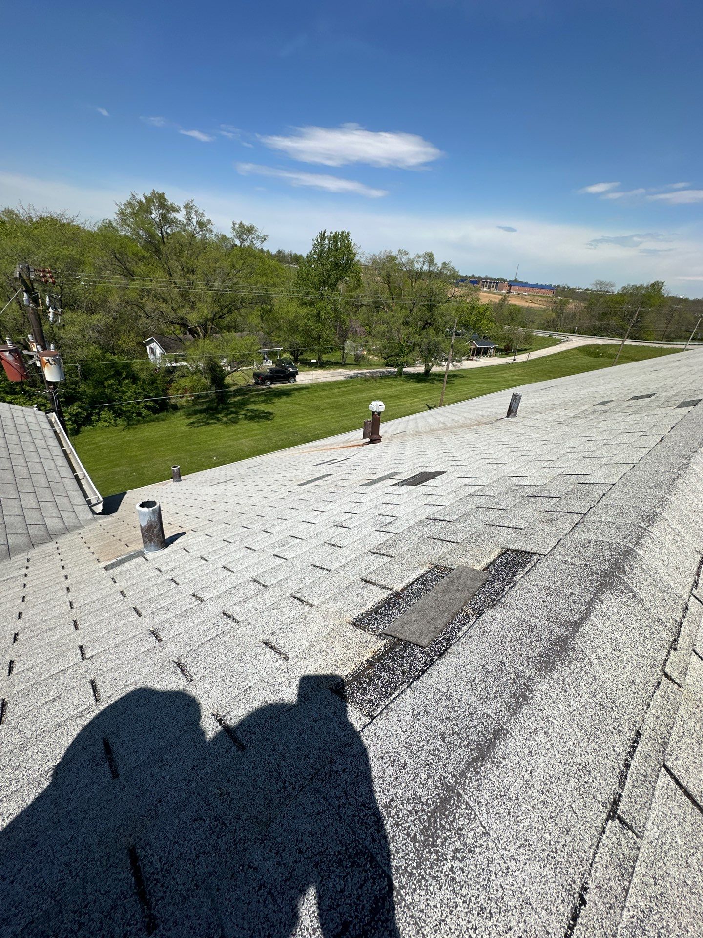Commercial Roofing Installation using Performance Shingles by Mr. Roofer