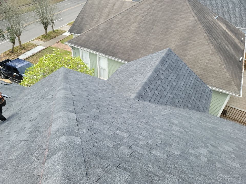 Residential Roofing Installation using Roof Replacement by American Roofing & Construction LLC