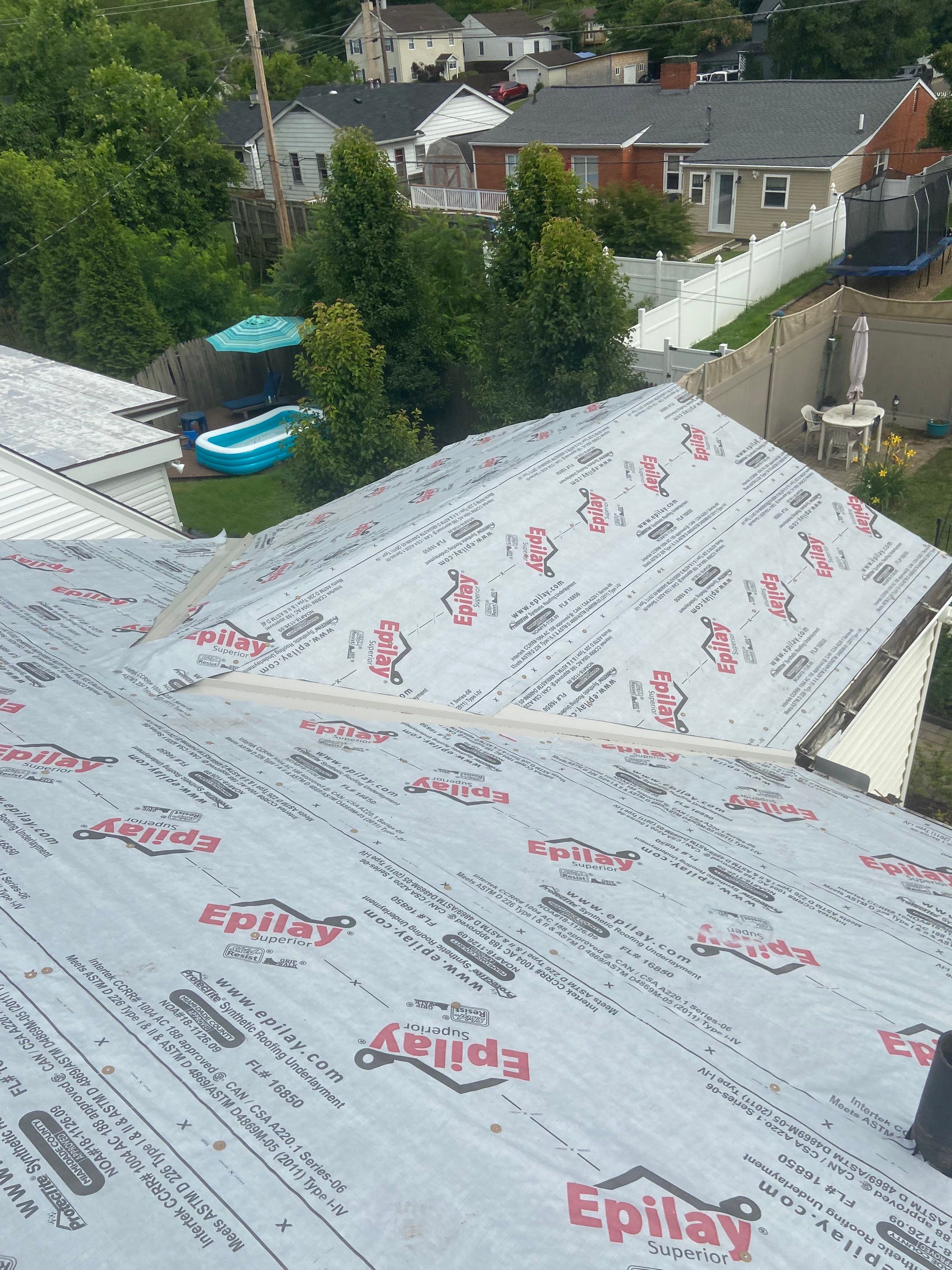 Metal Roofing, Skylights, Porch Build by Secure Construction Company Inc