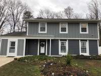 Siding Installation using JH Batten Smooth and JH Select Cedarmill Eased Edge by ExteriorPros