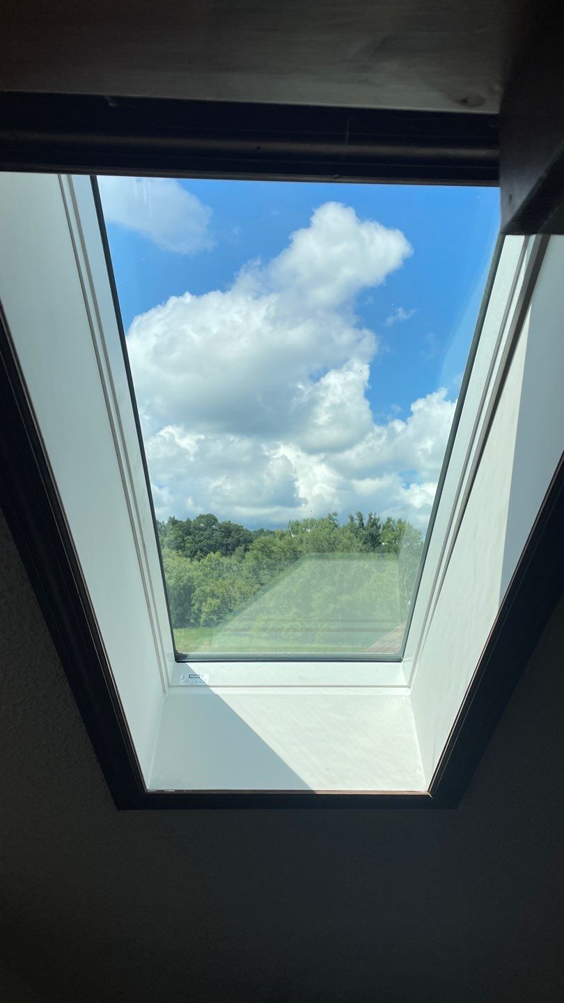Shingle Roofing with Velux Skylight replacement and stone chimney flashing by Secure Construction Company Inc