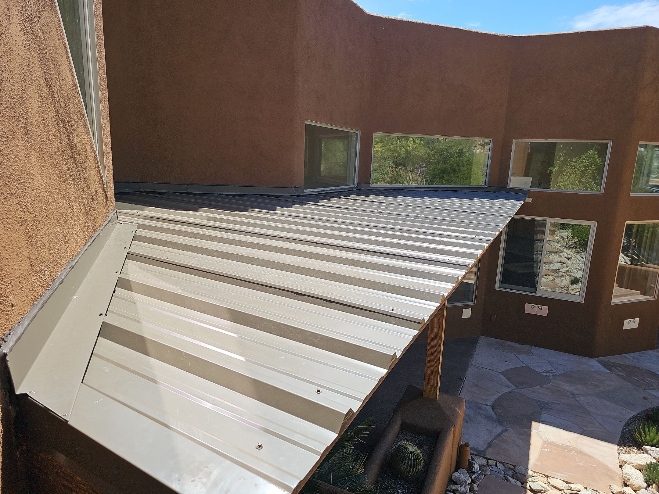 Light Stone Exposed Fastener by Reimagine Roofing