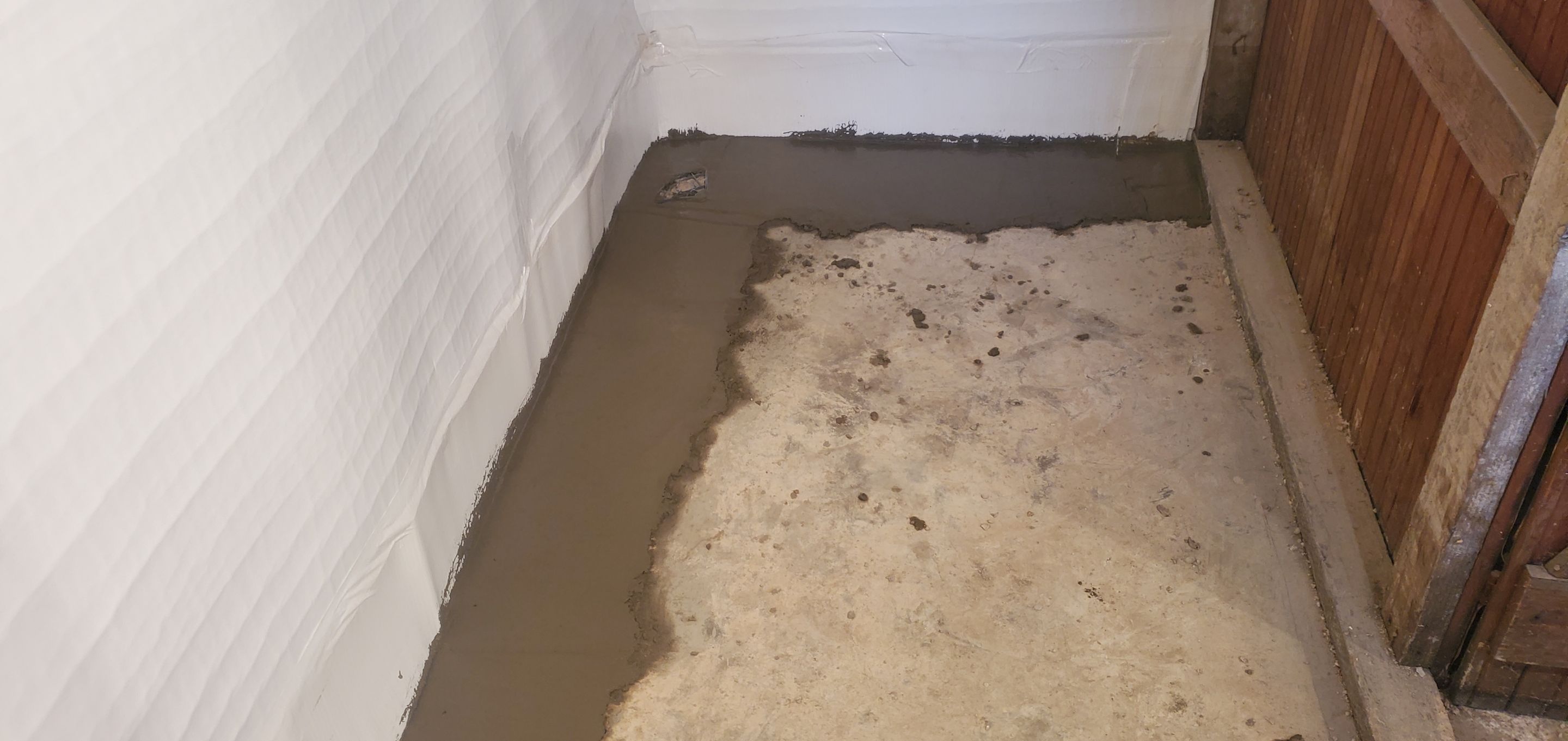 Interior Basement Waterproofing System using GrateDrain Waterproofing System by Toledo Basement Repair 