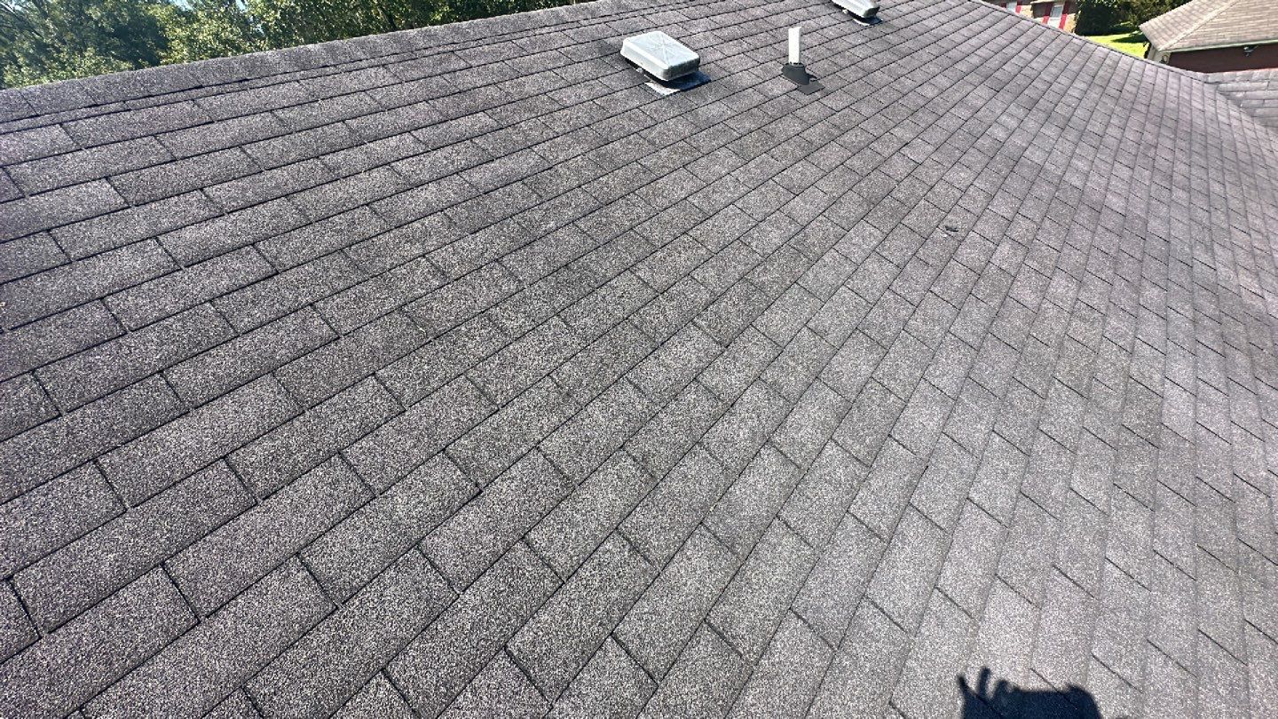Residential Roofing Installation using Benton 26Ga 1inc Snapcock Metal Roof KYNAR Matte Black by Talya Roofing