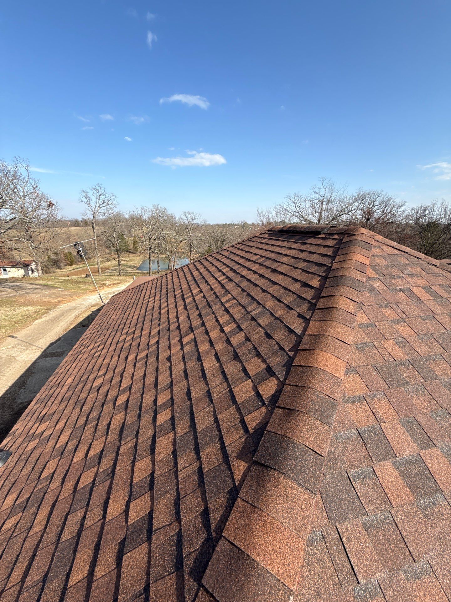 Rustic Hickory Shingles & SBS Cap & Base by In & Out Construction & Remodeling, LLC
