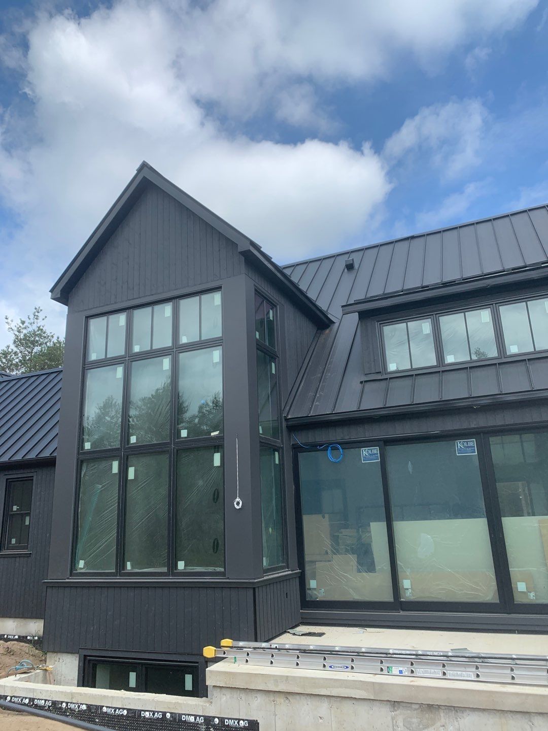 New Home Construction using 16" Standing Seam Panels by Jay Carter Roofing & Sheet Metal