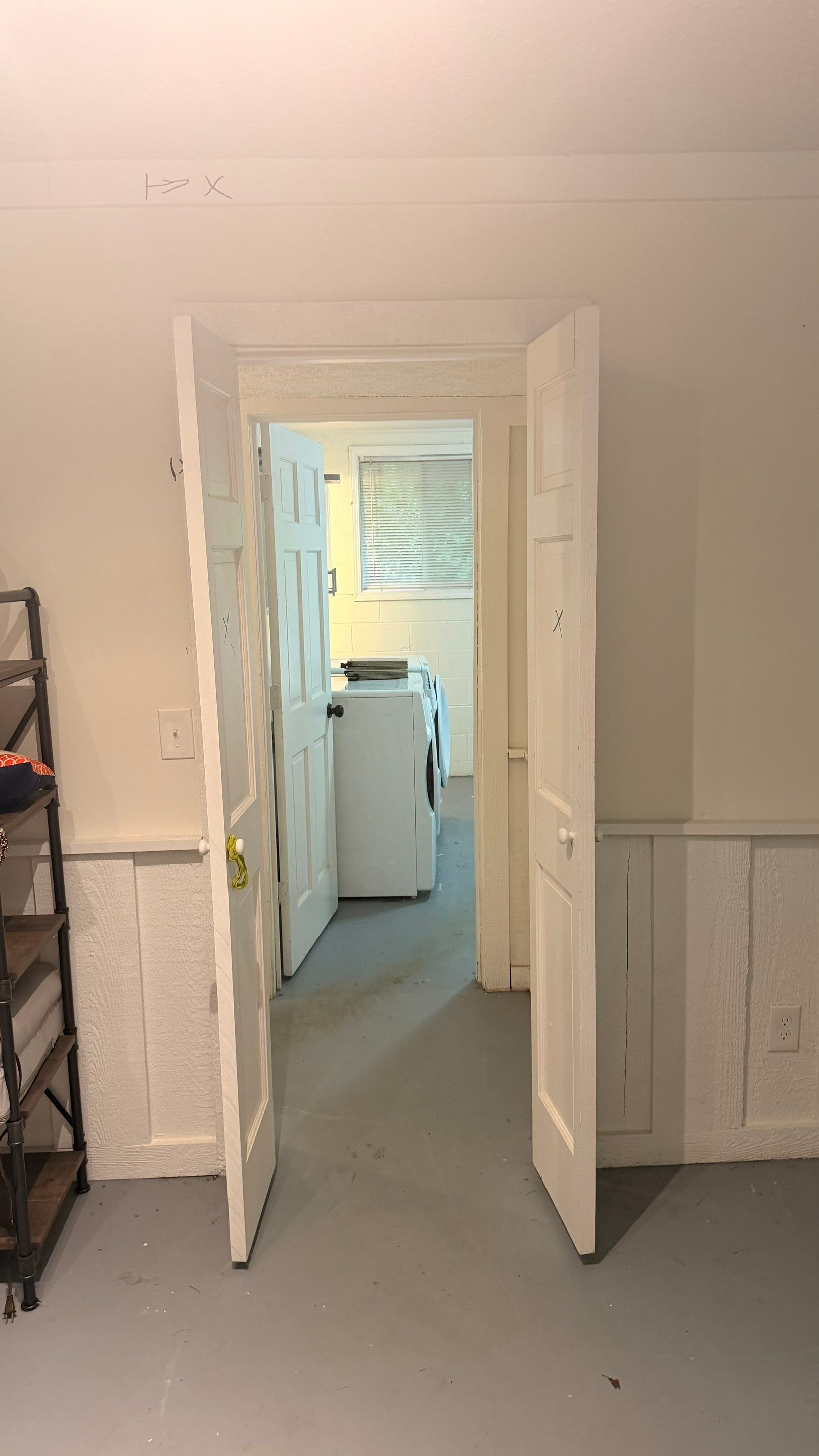 Basement Remodeling with Wood-Look Flooring and Custom Wainscoting in Dunwoody by Swift Home Renovations