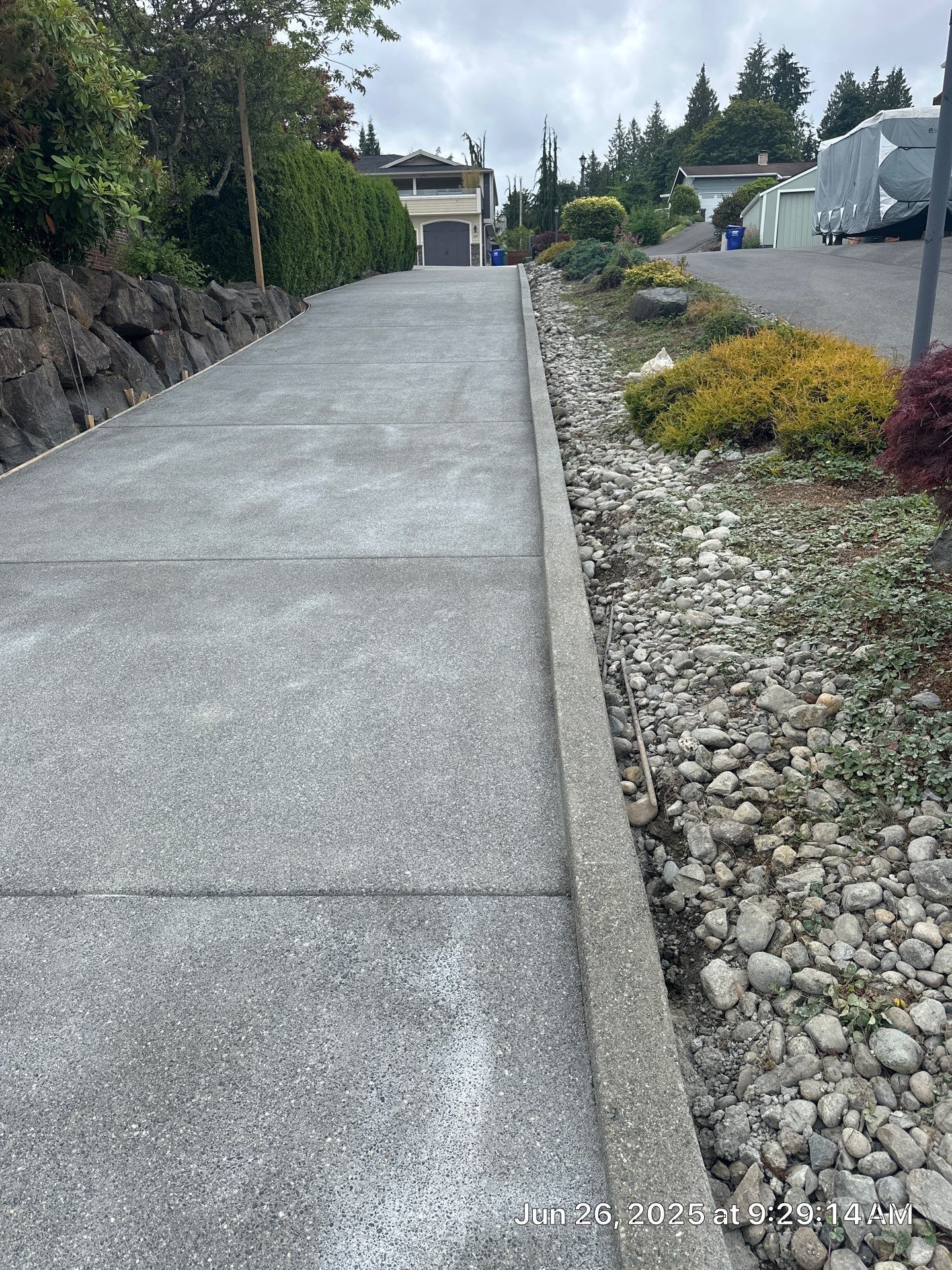 Concrete Driveway Makeover w/ Asphalt Patch | Everett  by Jireh Asphalt & Concrete Inc 