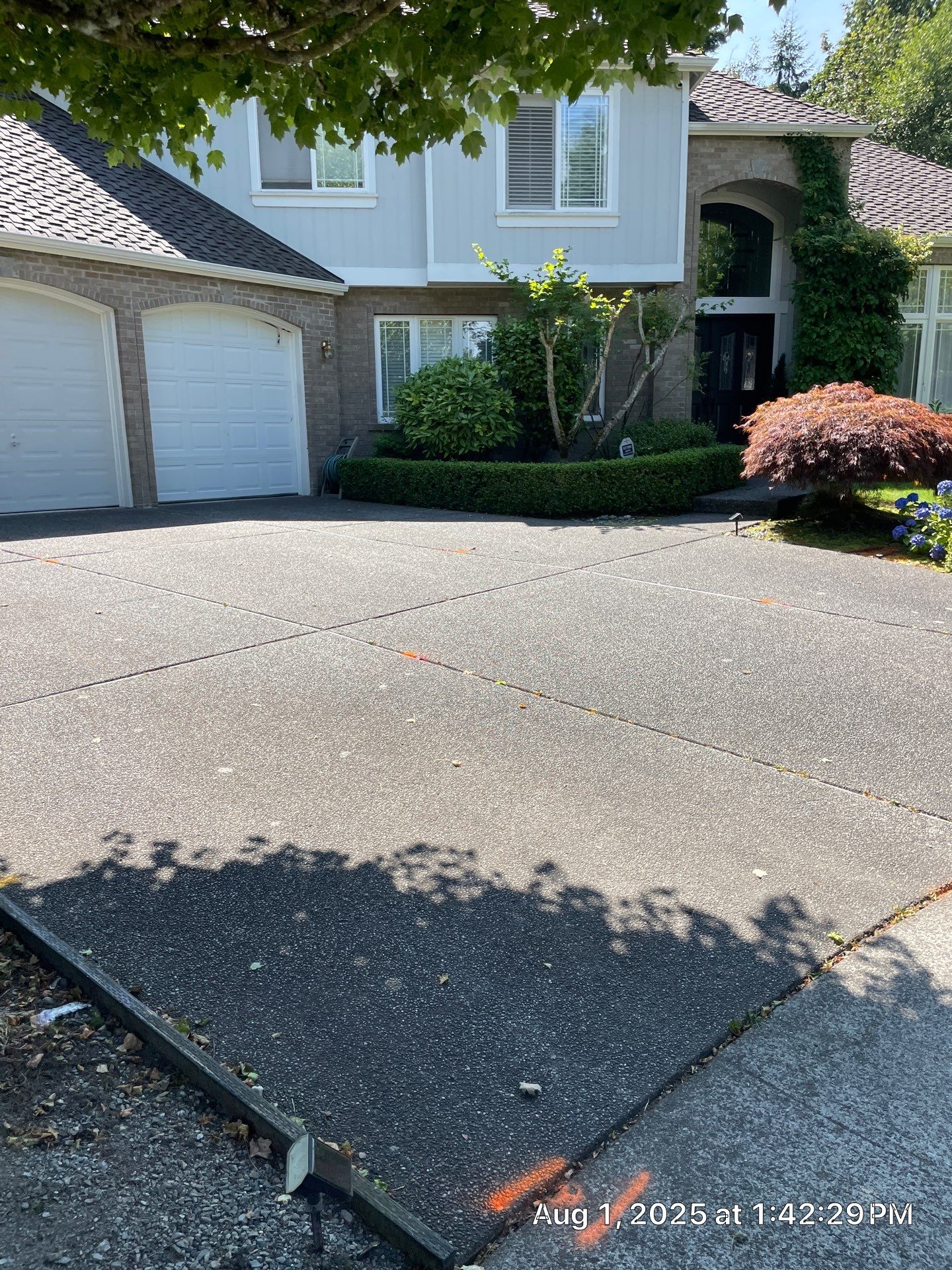 Multi-color Stamped & Sealed Concrete Driveway Renovation | Mukilteo by Jireh Asphalt & Concrete Inc