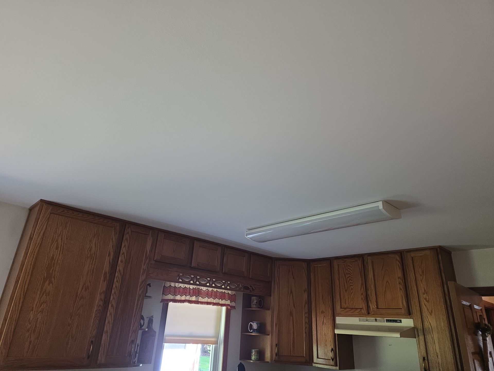 Interior Ceiling Repainting in Fremont Michigan by Gordon Painting