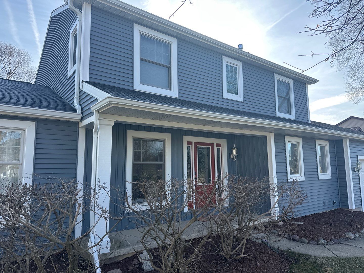 Complete Roof and Siding Installation in Haslett by Acme Exteriors