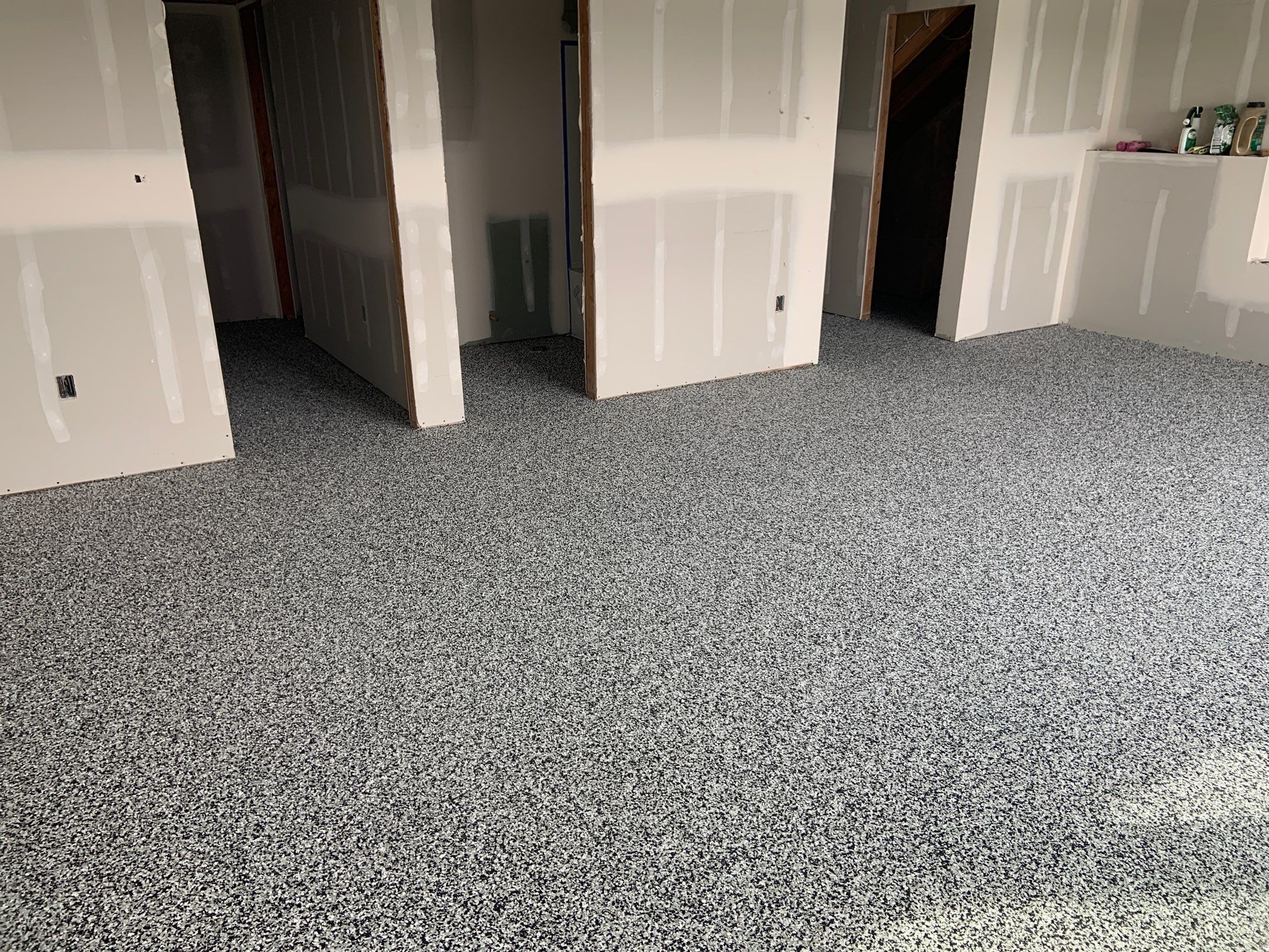 Basement Transformation using Domino by Croc Coatings, LLC