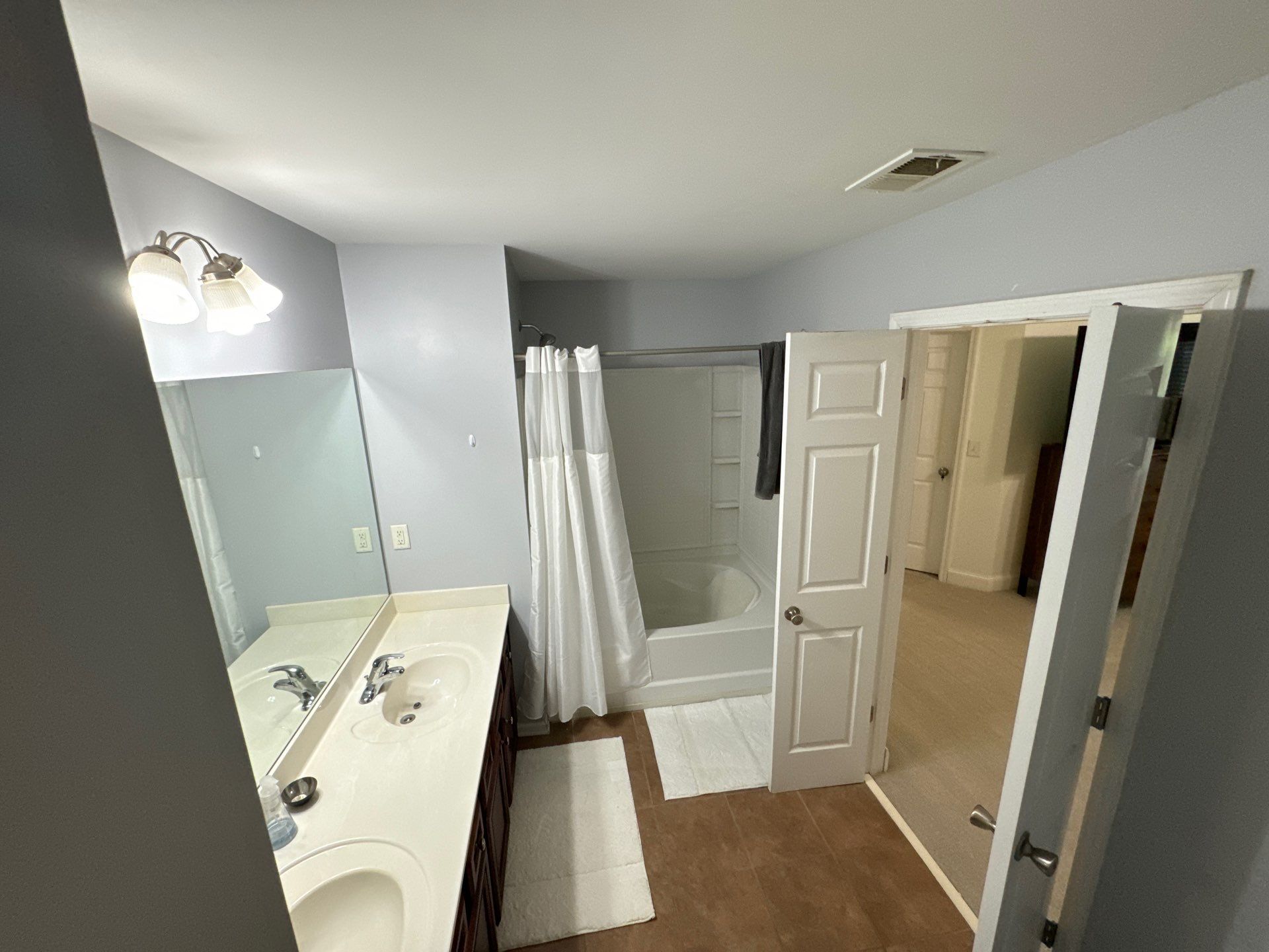 Tub to walk-in shower conversion, and tile flooring by Prudencio