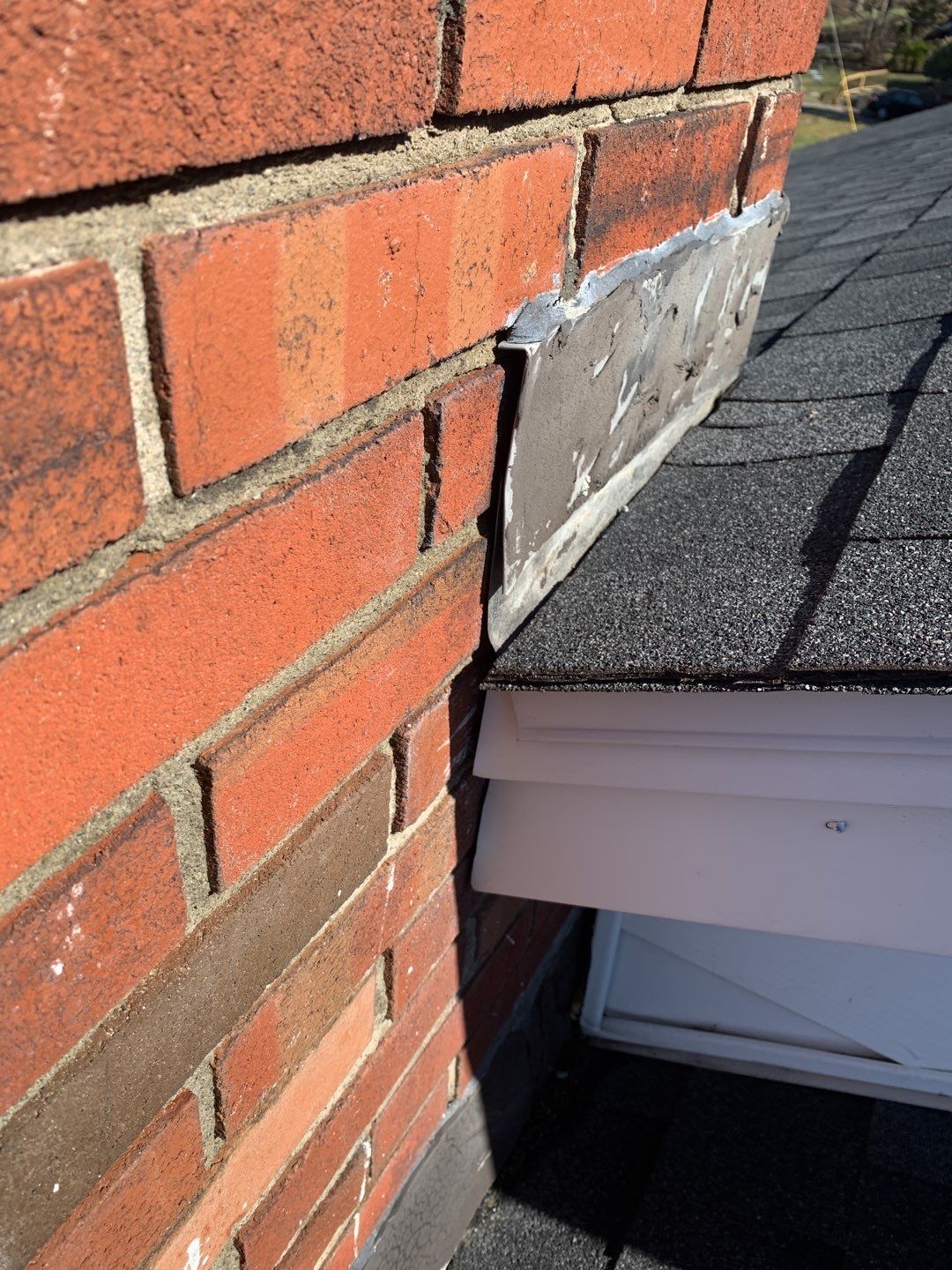 Residential Roofing Repair using Chimney Flashing by A Plus Exterior