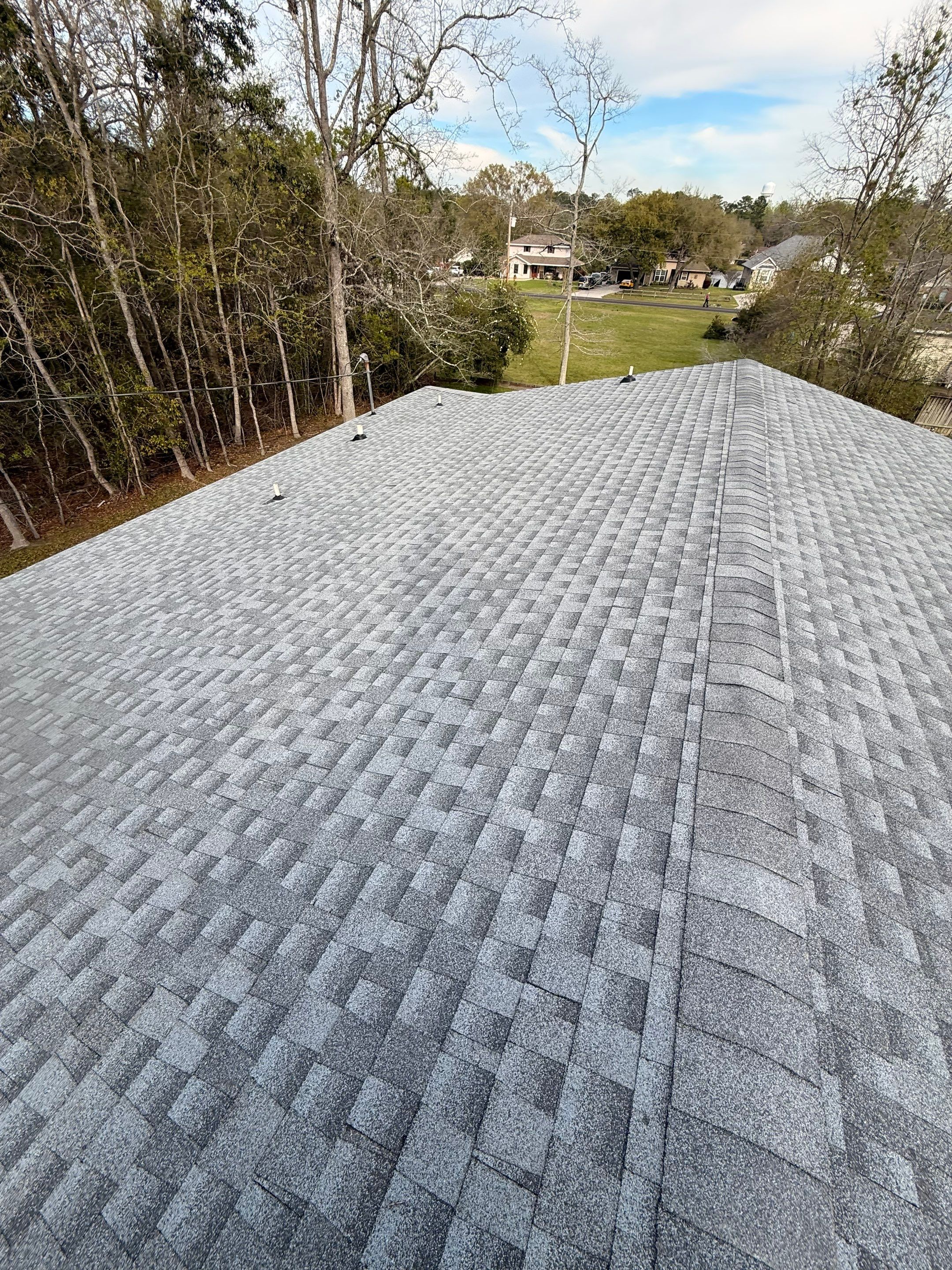 Full Asphalt Shingle Roof Replacement and Decking Repair in Carriere by Frontline Roofing