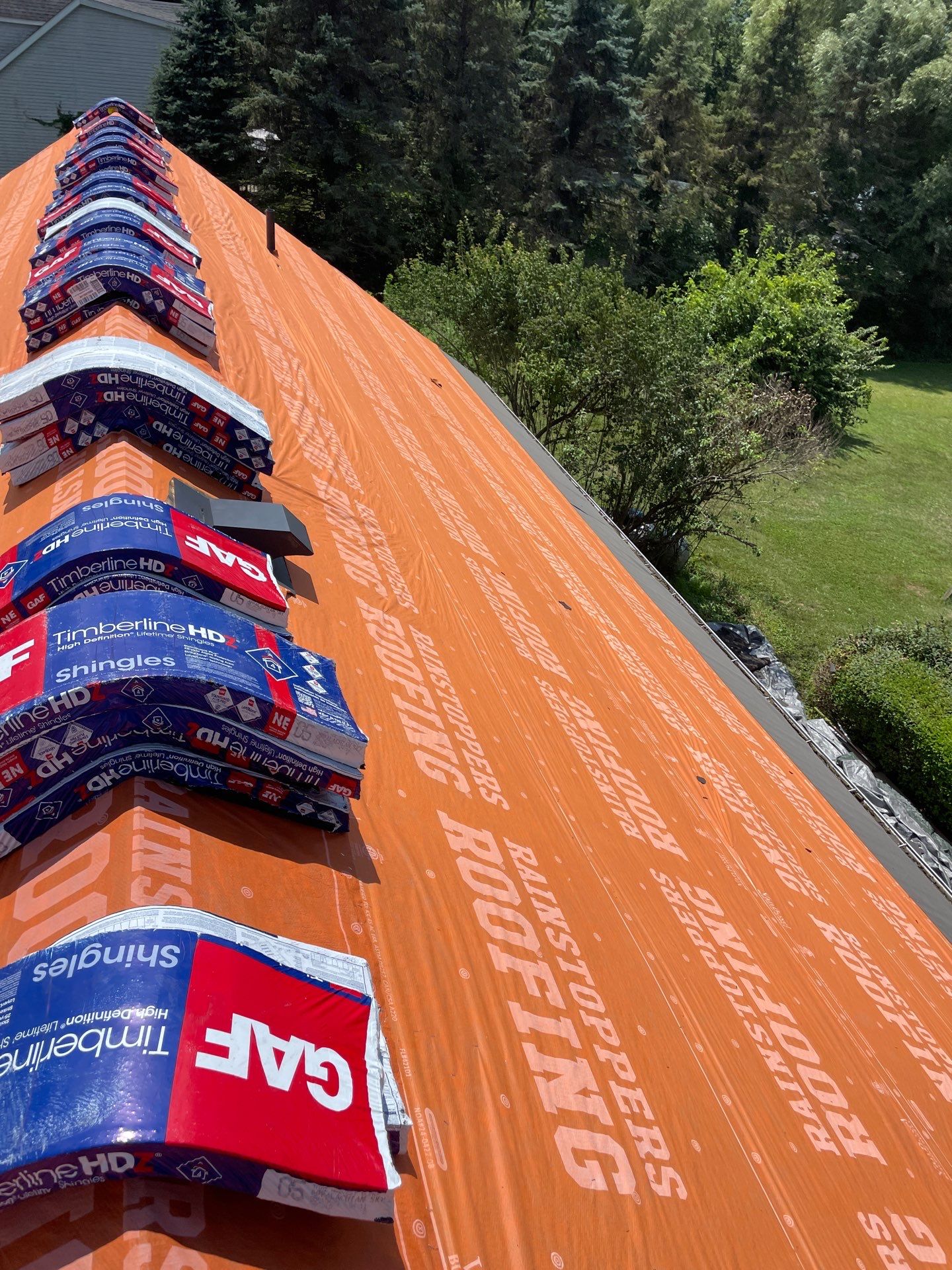 Residential Roofing Installation using GAF Timberline HDZ Charcoal by Rainstoppers Roofing