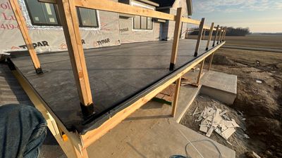 Residential Roofing Installation using 60 mil rubber roof 