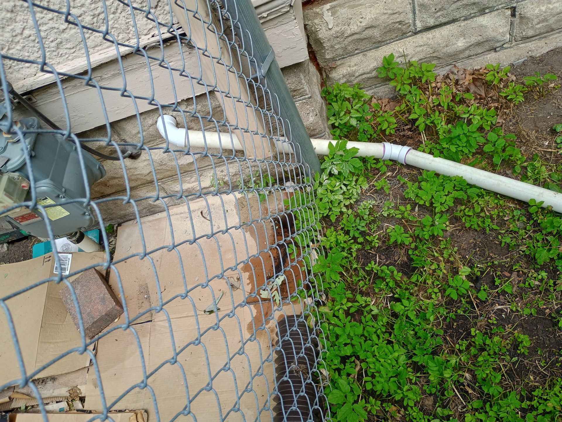 Sump Pump & Buried Discharge in Northeast Minneapolis by Waterproofing Northeast