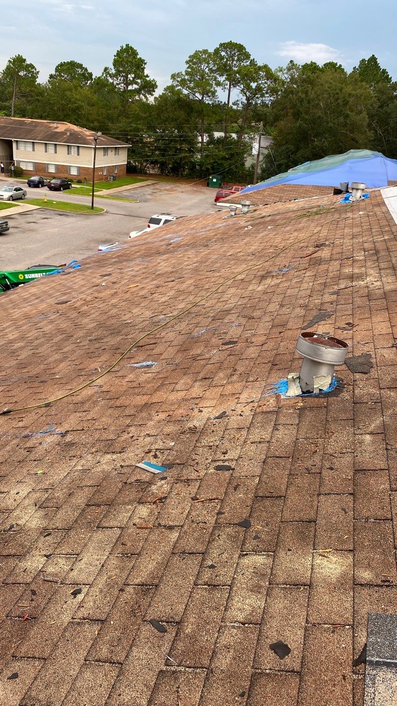 Commercial Roofing Installation using Roof Replacement by American Roofing & Construction LLC