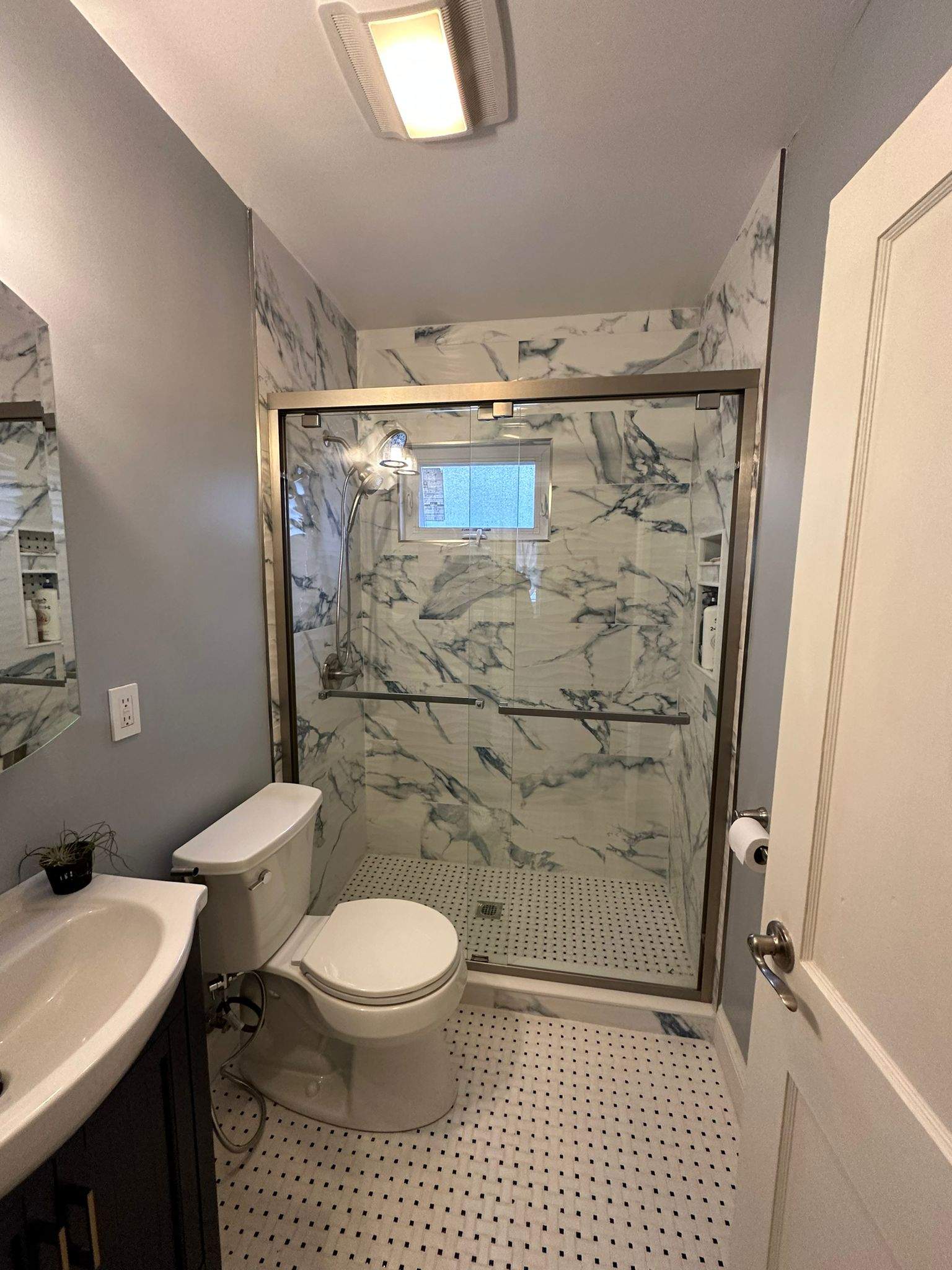 Bathroom Remodel using Tile by Home Concepts Construction