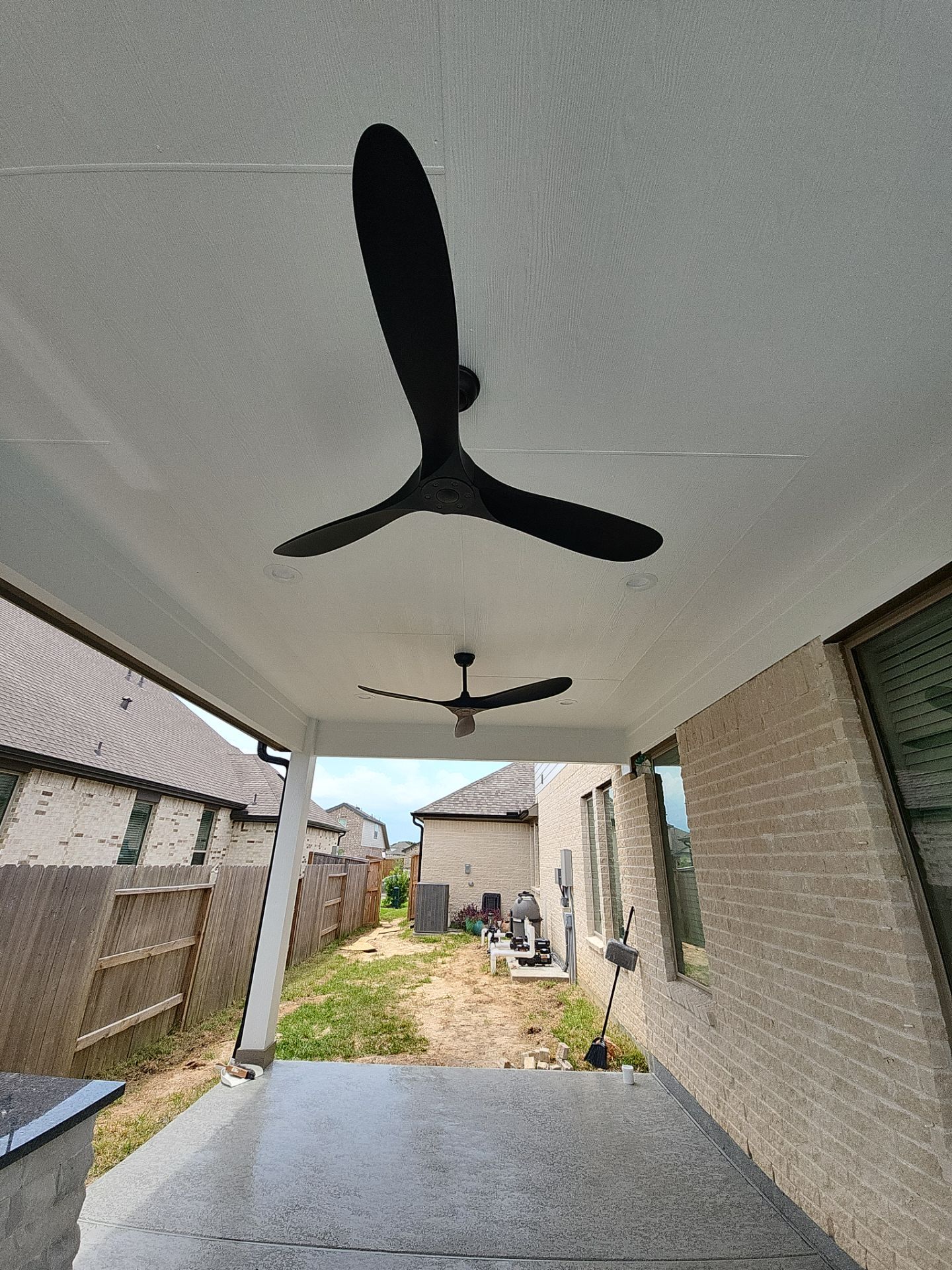 Patio and Summer Kitchen in Texas city by SophAlx LLC