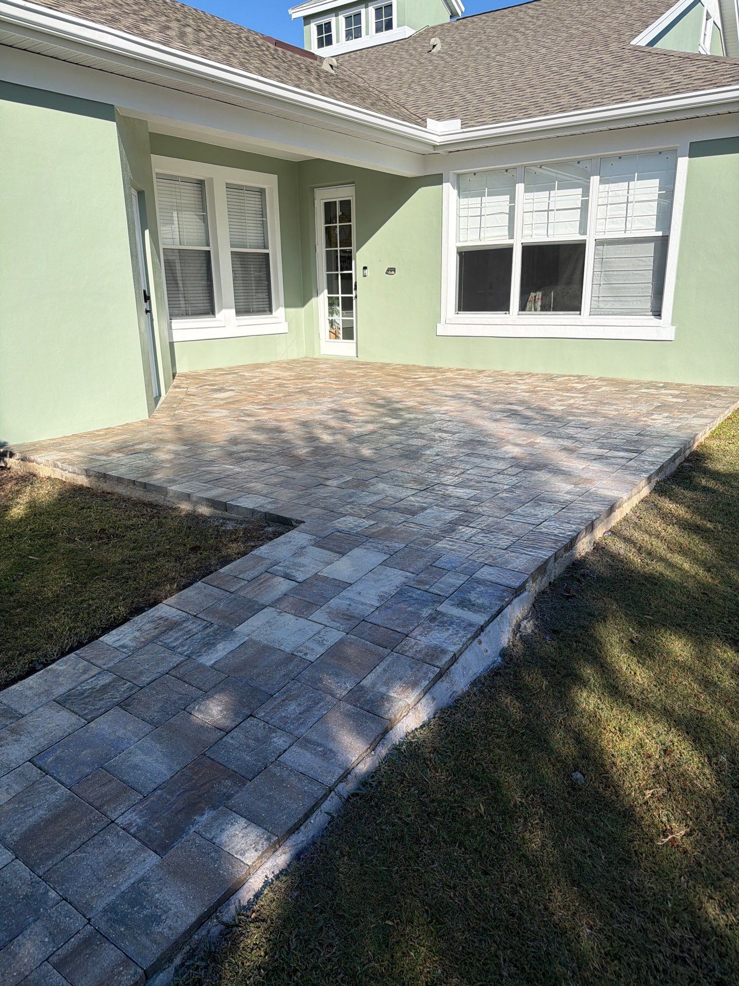 Multi-Toned Paver Patio and Walkway sealing in Mira Bay Apollo Beach by Supreme Paver Experts