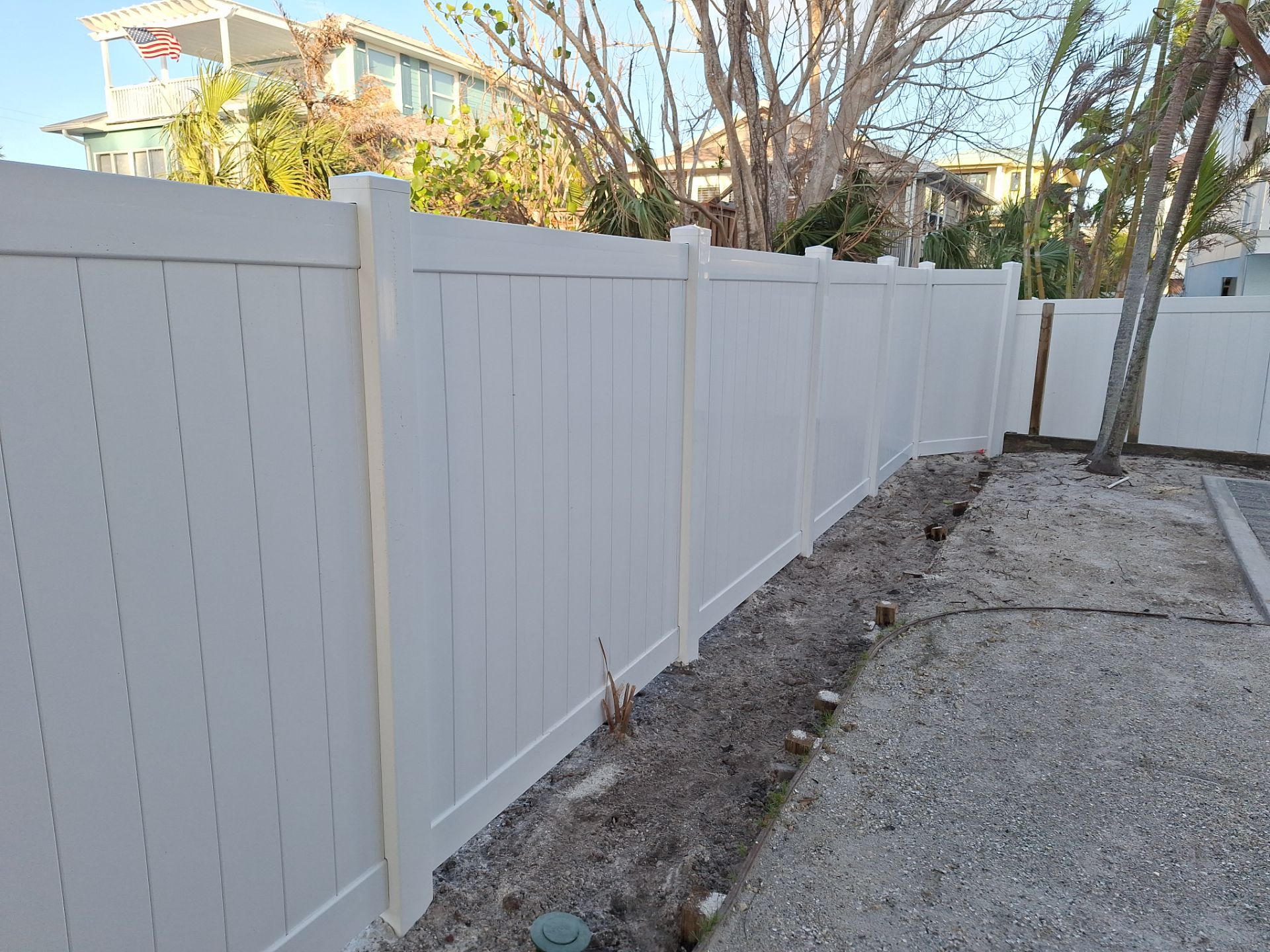 Vinyl Fence Installation using 6Ft Vinyl Privacy Fence with a 4Ft White Picket Fence by Asap fence and gates, LLC