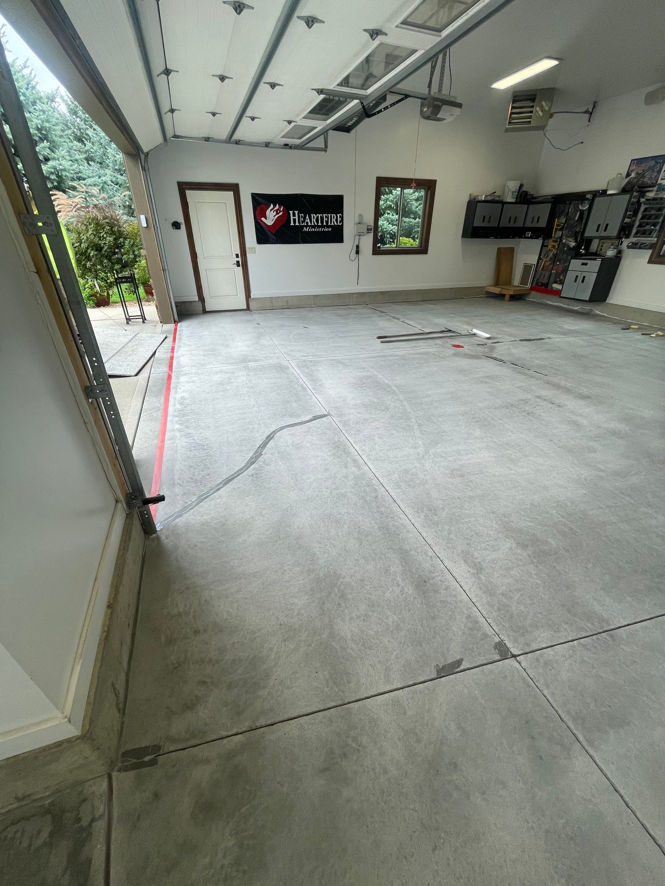 Garage Floor Coating and Domino Flake Finish in Sioux Falls by Select Painting, Coatings & Garage Cabinets