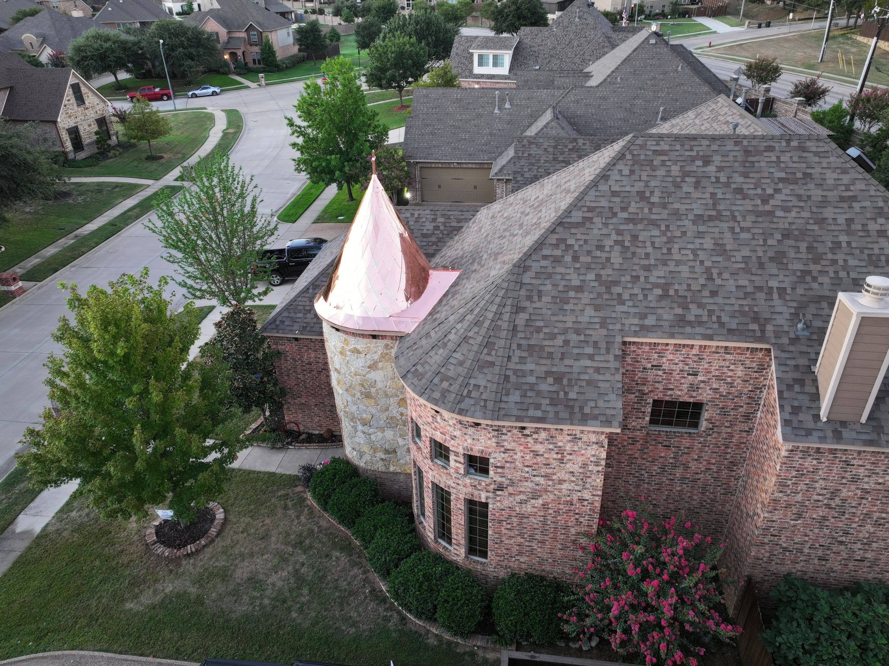 Installing Custom copper turret and Malarkey Vista Class 4 shingles Hail Damage Upgrade by Becker Roofing and Exteriors