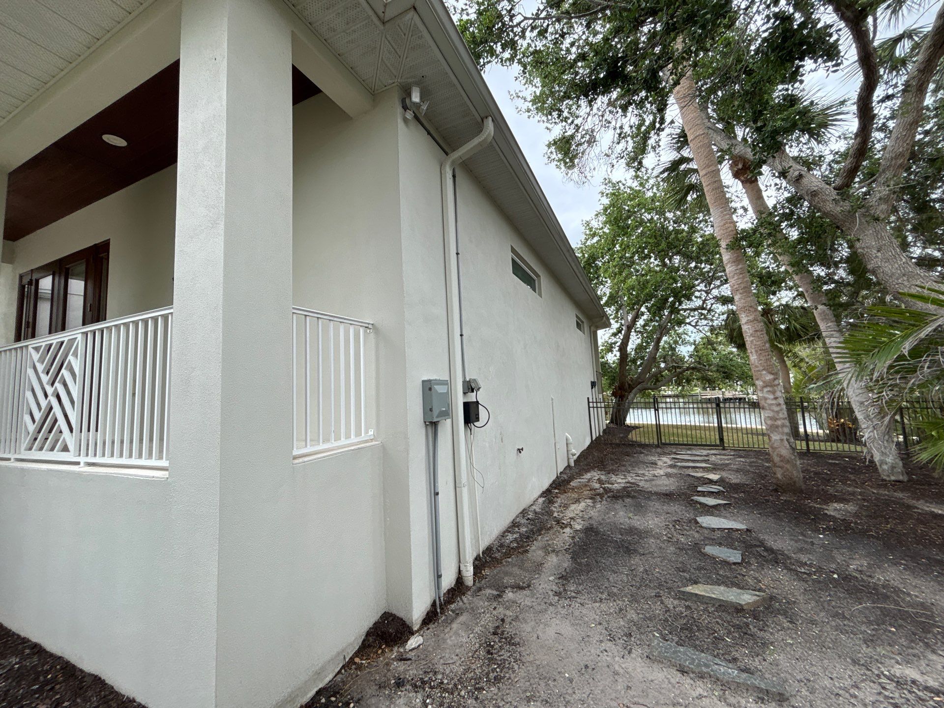 6-Inch White Seamless Gutters Installation in Siesta Key FL by Gutter Professors