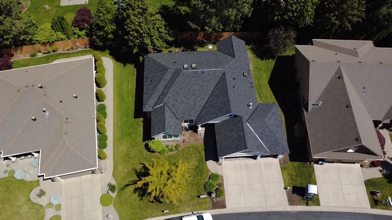 Full Residential Roof Replacement and Skylight Installation in E 54th Ln Spokane, WA 99223 The Alpine Premium System - Certainteed Landmark® PRO Shingle - Max Def Moiré Black. - Certainteed ShadowRidge - Certainteed SwiftStar - Certainteed RoofRunner - Vycor 40 Mils. Ice & Water Shield - Certainteed Ridge Ventilation Included - Priority Scheduling - 5-Star PREMIER SureStart PLUS Coverage - CertainTeed 50 Year Material Guarantee - CertainTeed Workmanship Guarantee: LIFETIME - CertainTeed Warranty Transfer Period: 30 Years by Alpine Roofing