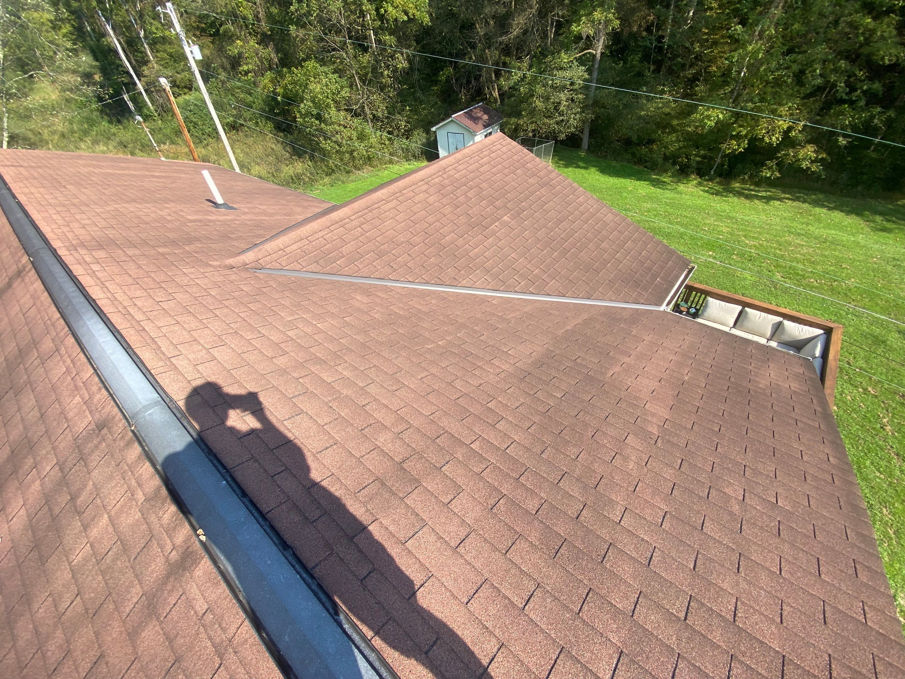 Metal Roof and Vinyl Siding, Soffit, Gutters using LifeTite Premium metal roofing  by Secure Construction Company Inc
