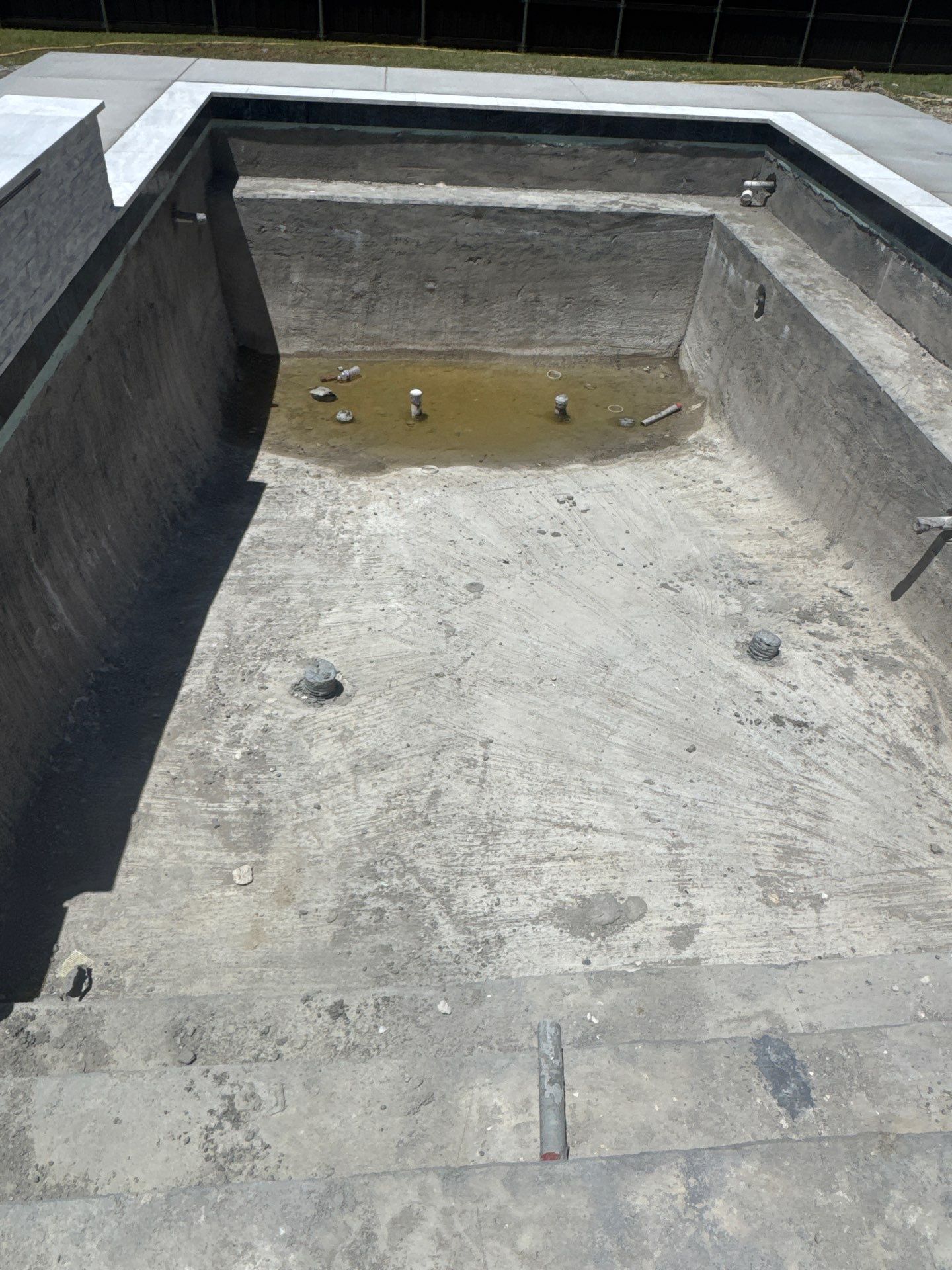Modern Geometric Pool with Raised Wall Feature by Pinnacle Pools and Spas - DFW