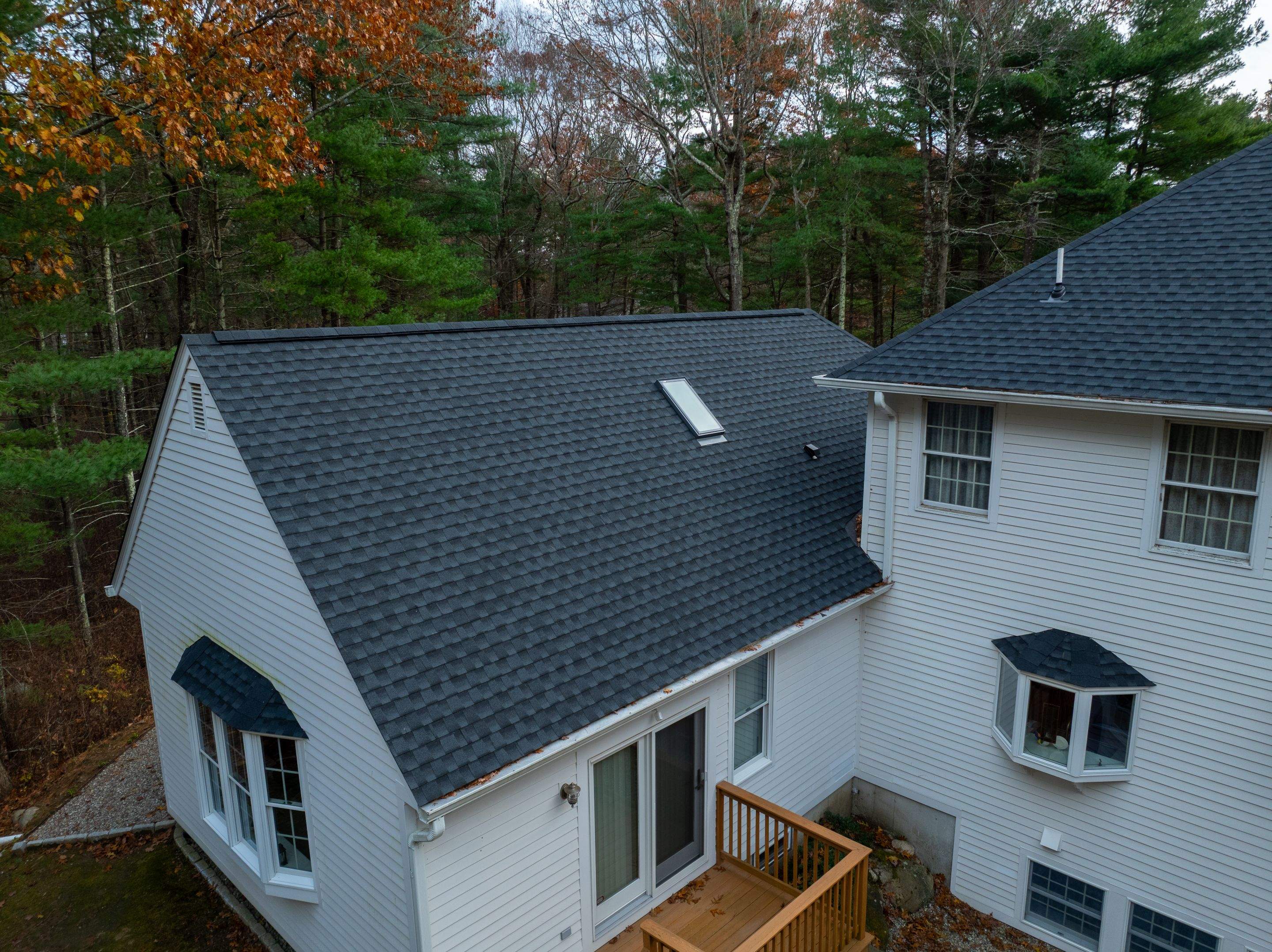 High Hawk - Architectural Shingles, Copper Brick Flashing, Skylights by Rinaldi Brothers