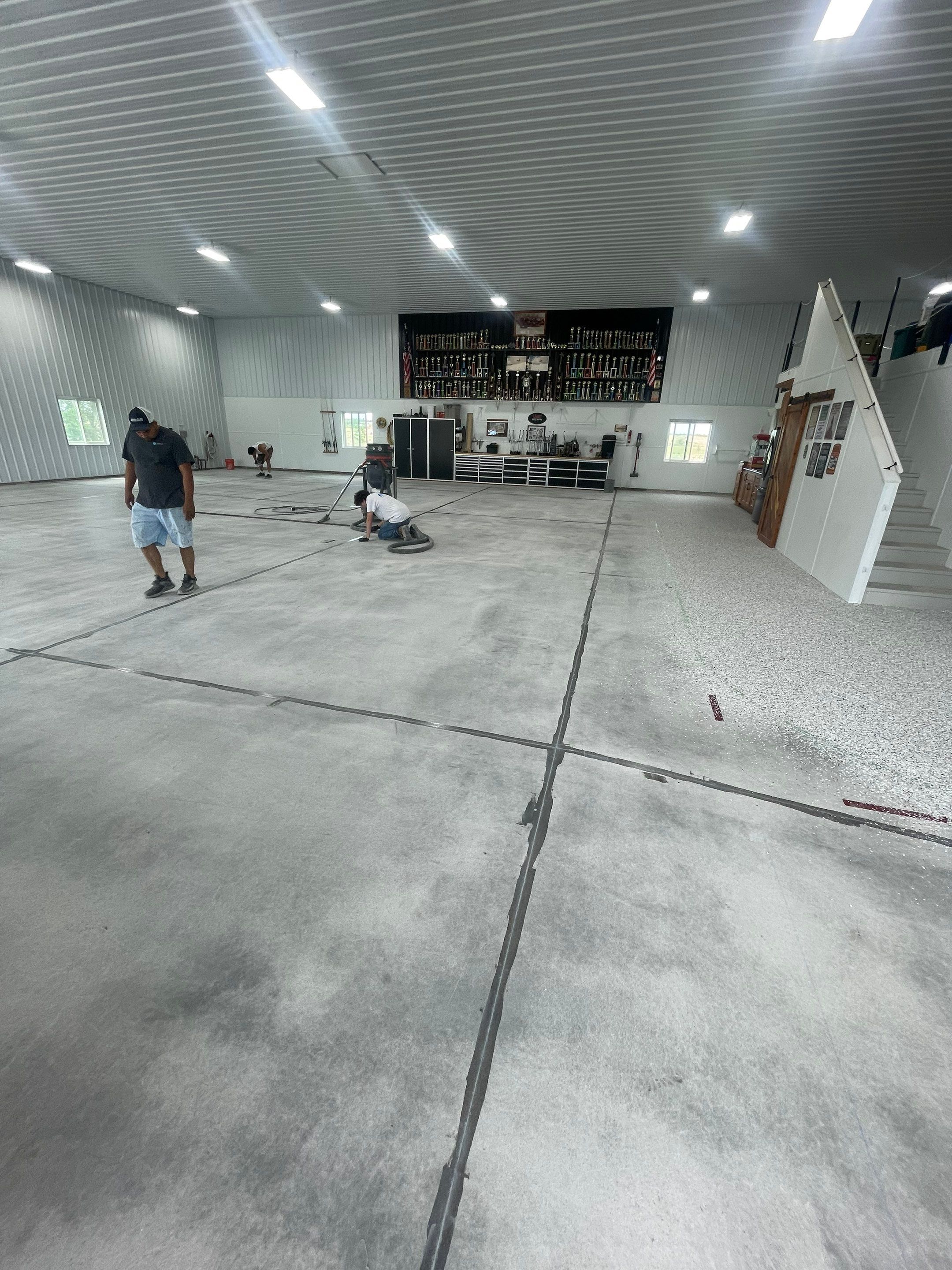 Multi-Stage Concrete Floor Coating for Egan Shop and RV Storage by Select Painting, Coatings & Garage Cabinets