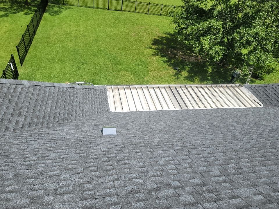 Residential Roofing Installation using Roof Replacement by American Roofing & Construction LLC