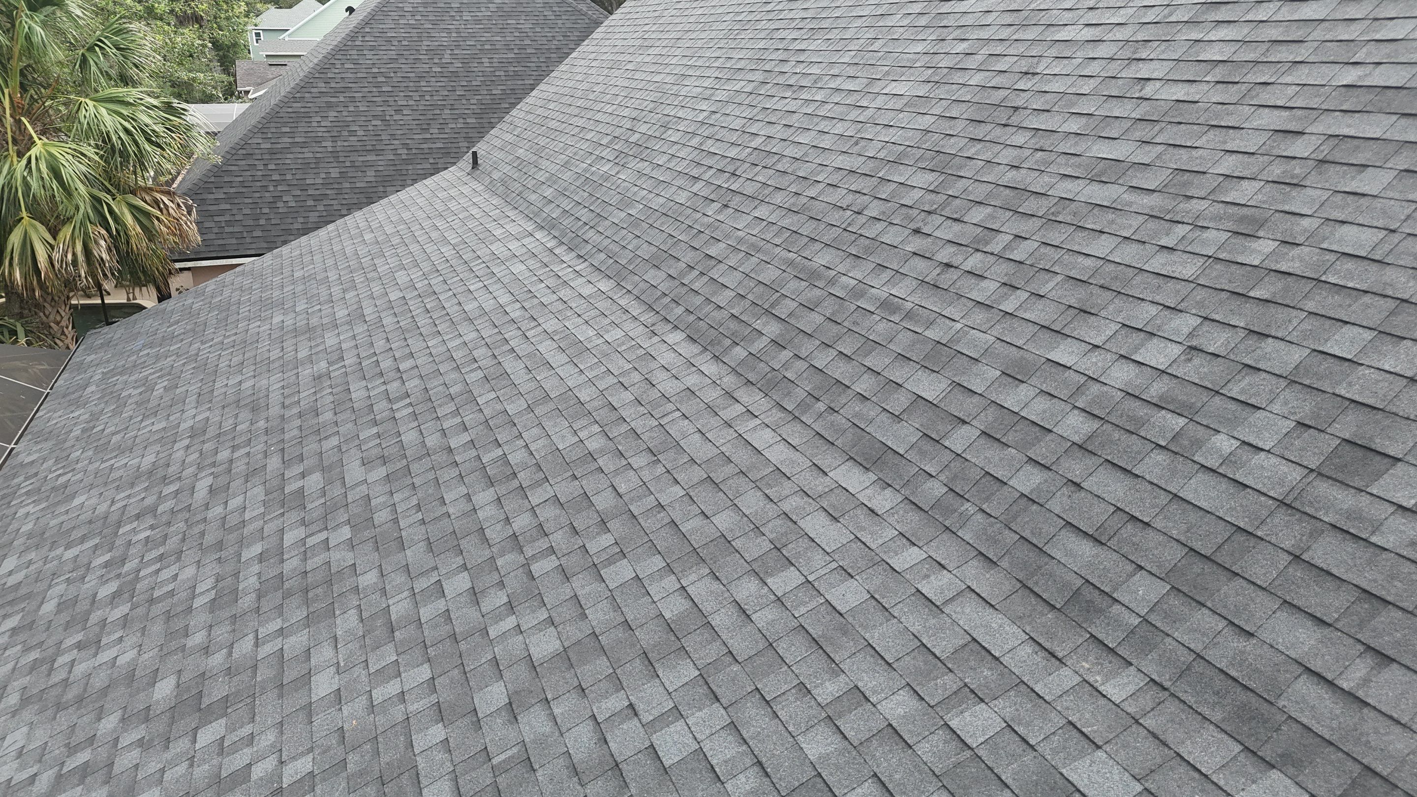 Comprehensive Onyx Black Asphalt Shingle Roof Replacement for Flagler Beach Residence by Trinity Restoration and Roofing LLC