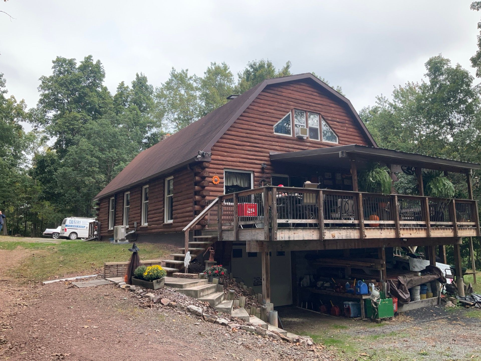 Log Cabin Standing Seam Metal Roof and Skylight Replacement by Esh Builders