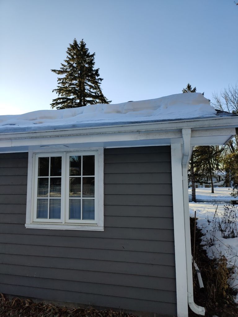 Steaming and Installing New Covers and Heating Cable by Next Level Seamless Gutters / Exteriors Inc.