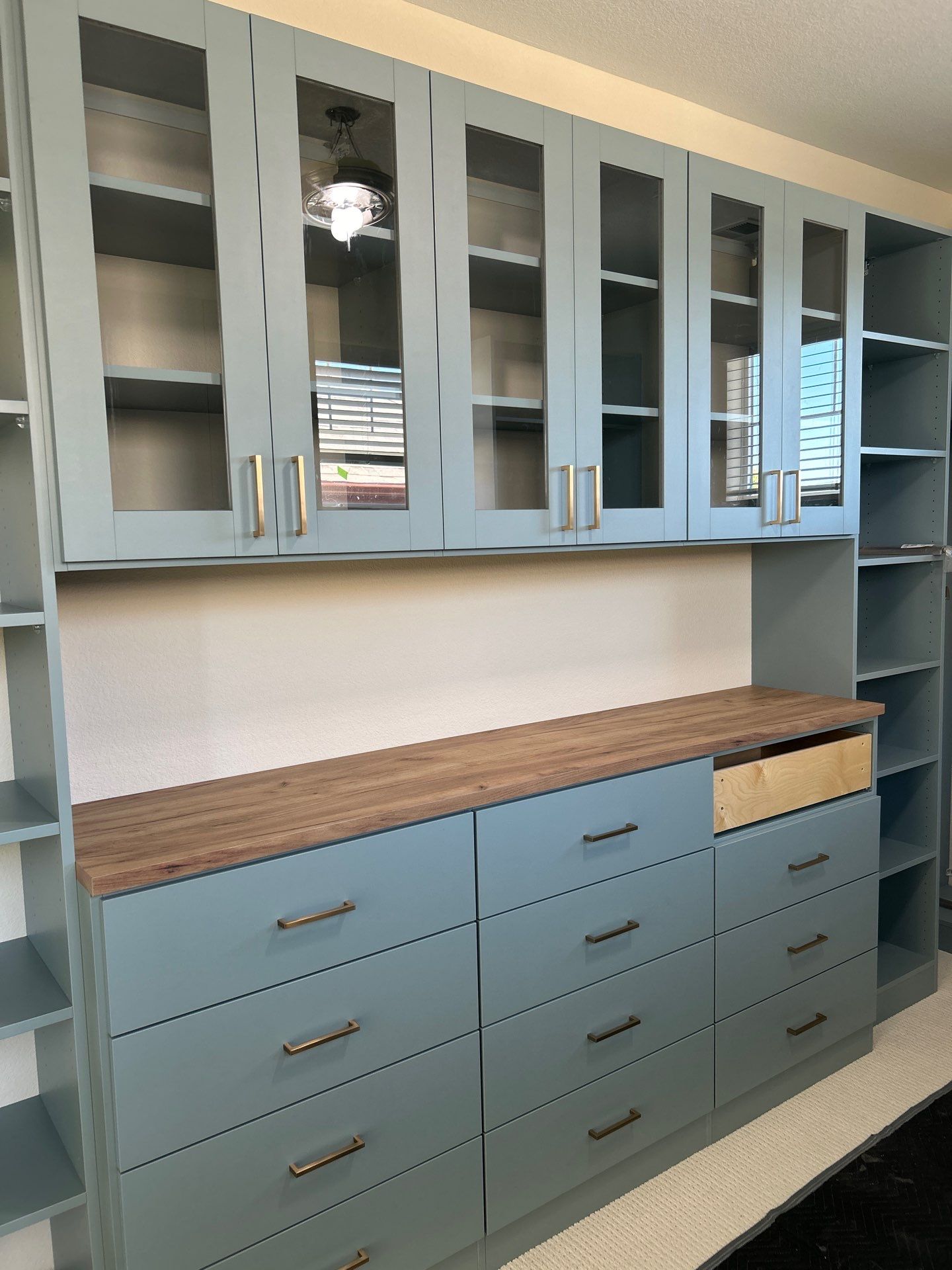 Multiple Closet Installations in Longmont by Concept 32, Inc.